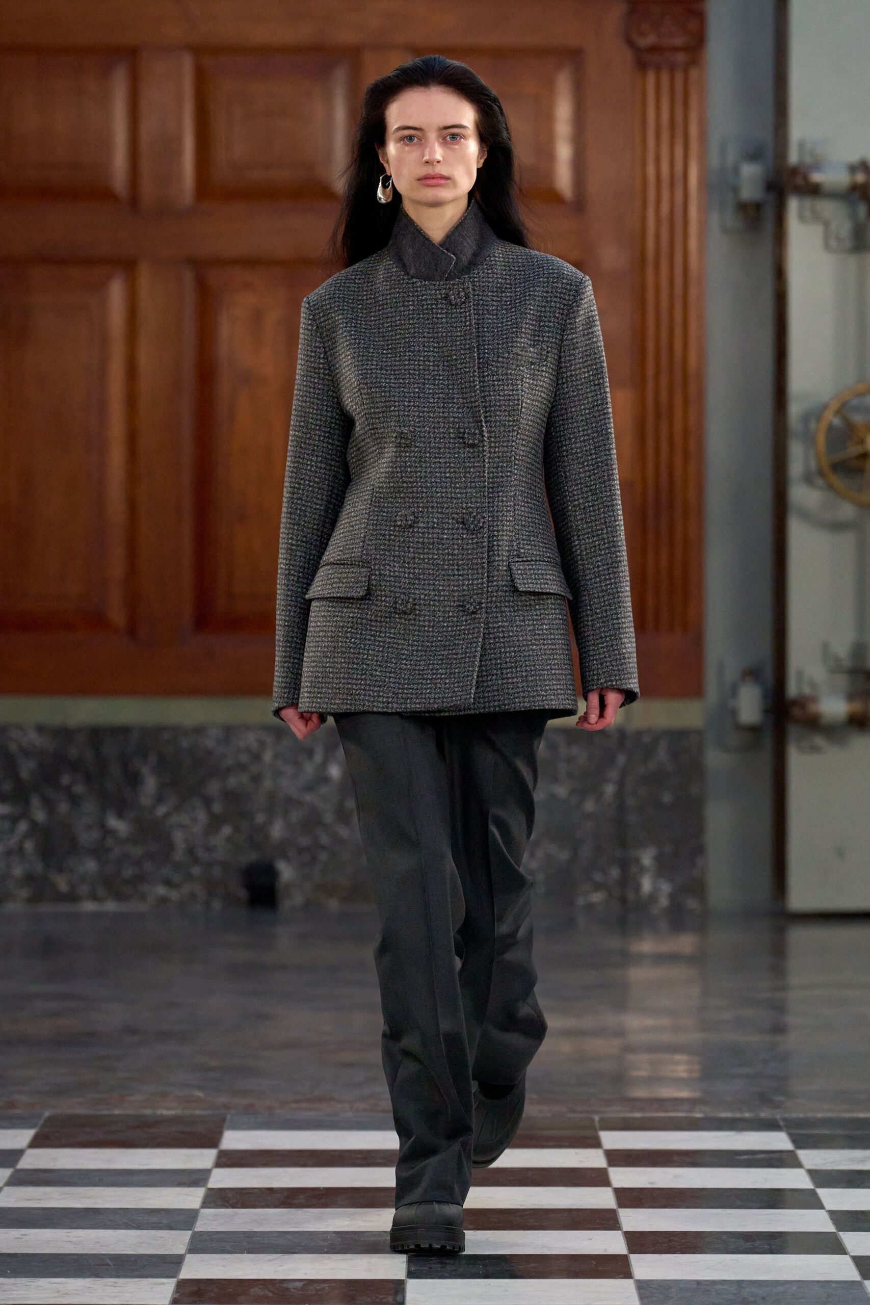 gray tailored blazer with black pants