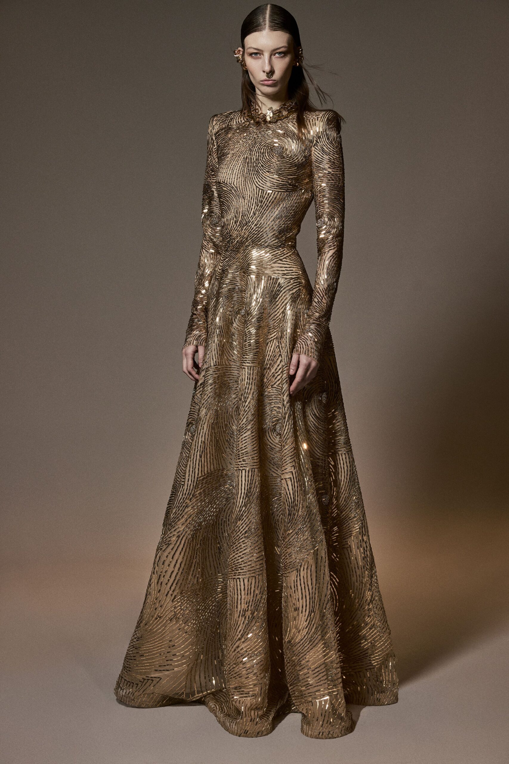 gold sequined long-sleeve gown