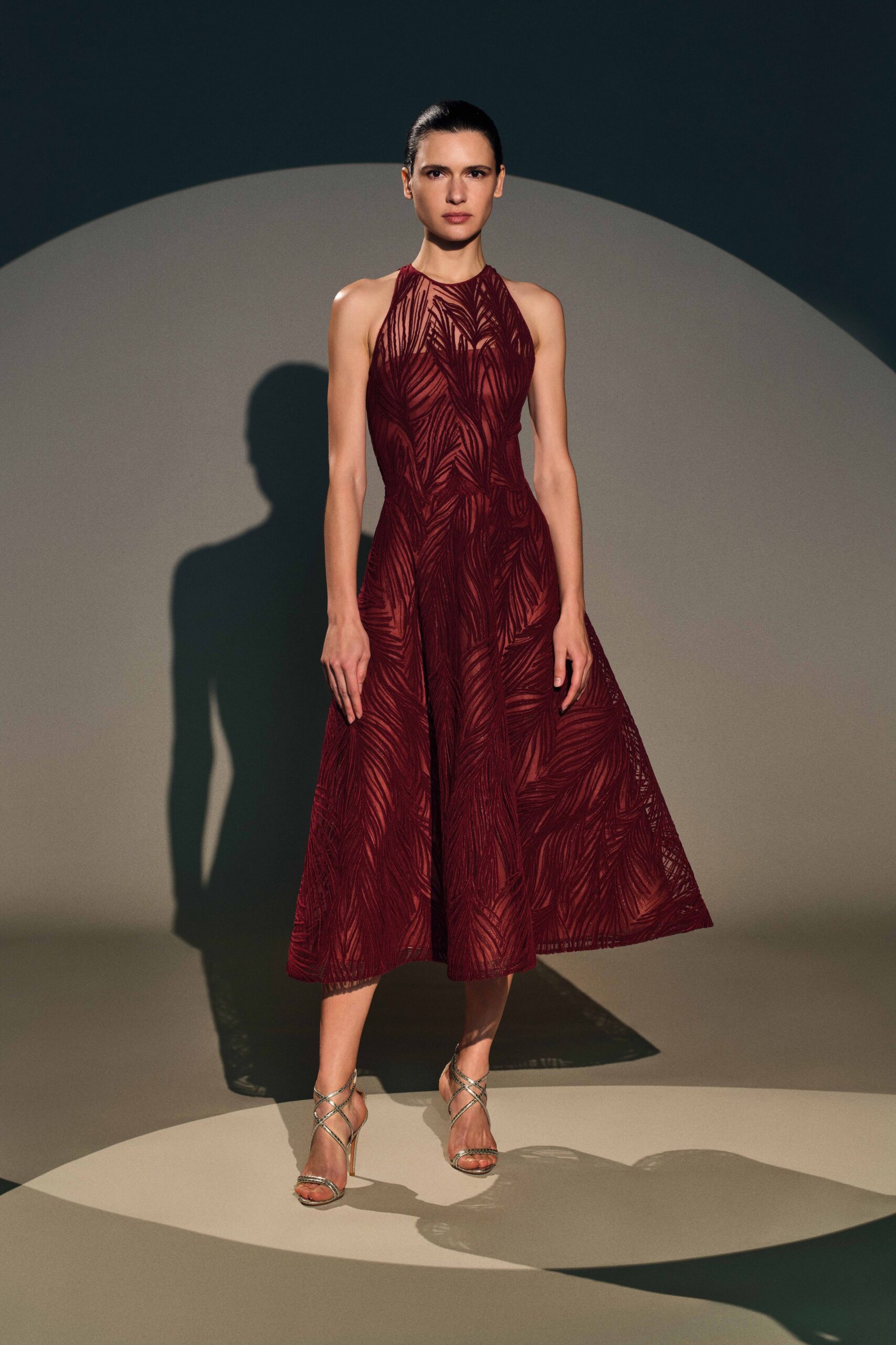 red silk halter dress with strappy shoes