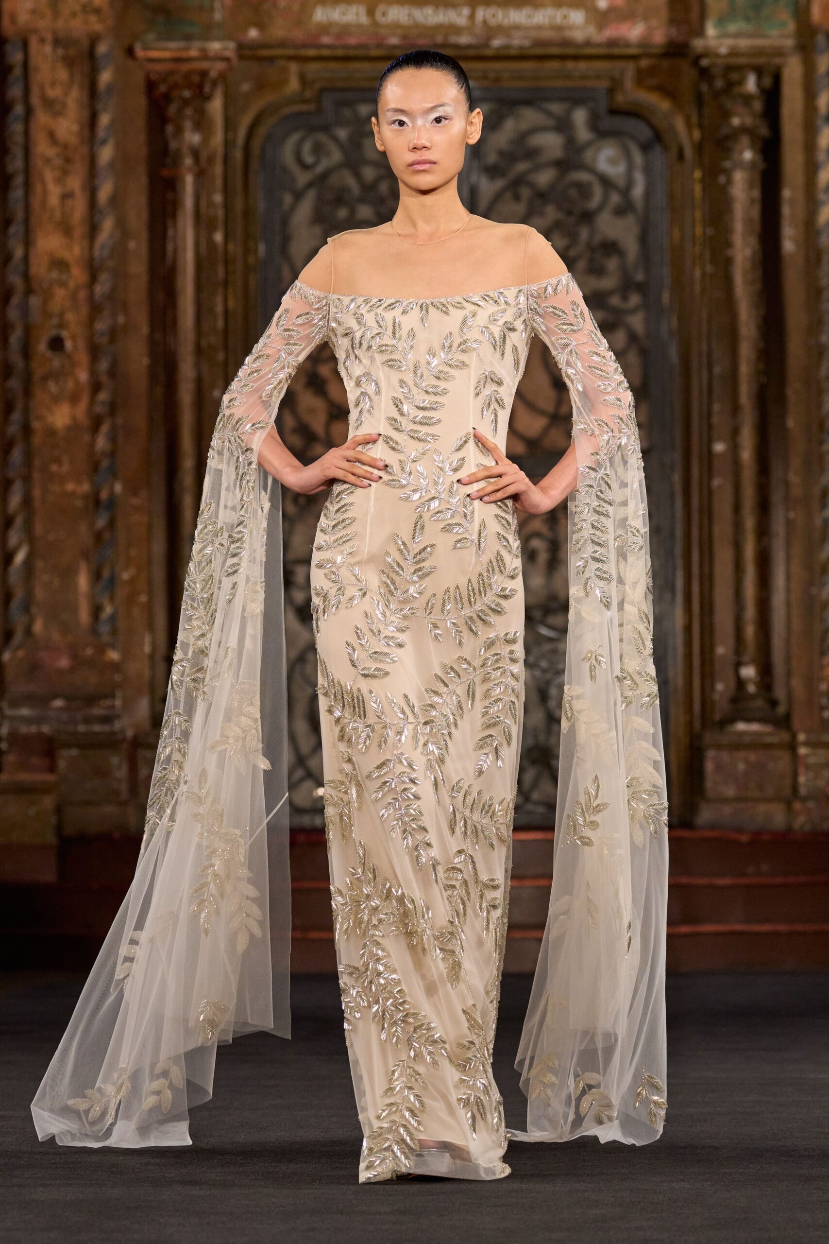 beige embroidered off-shoulder gown