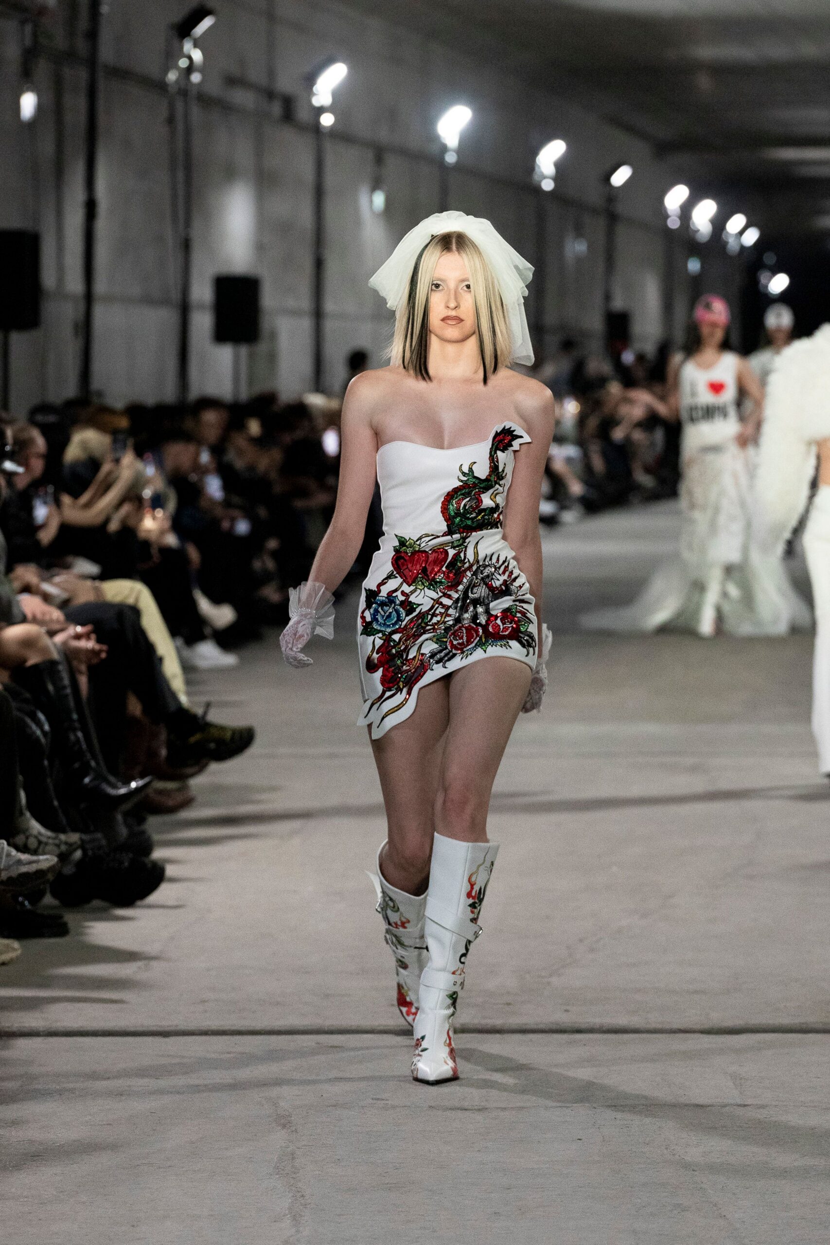 white embroidered mini-dress with boots
