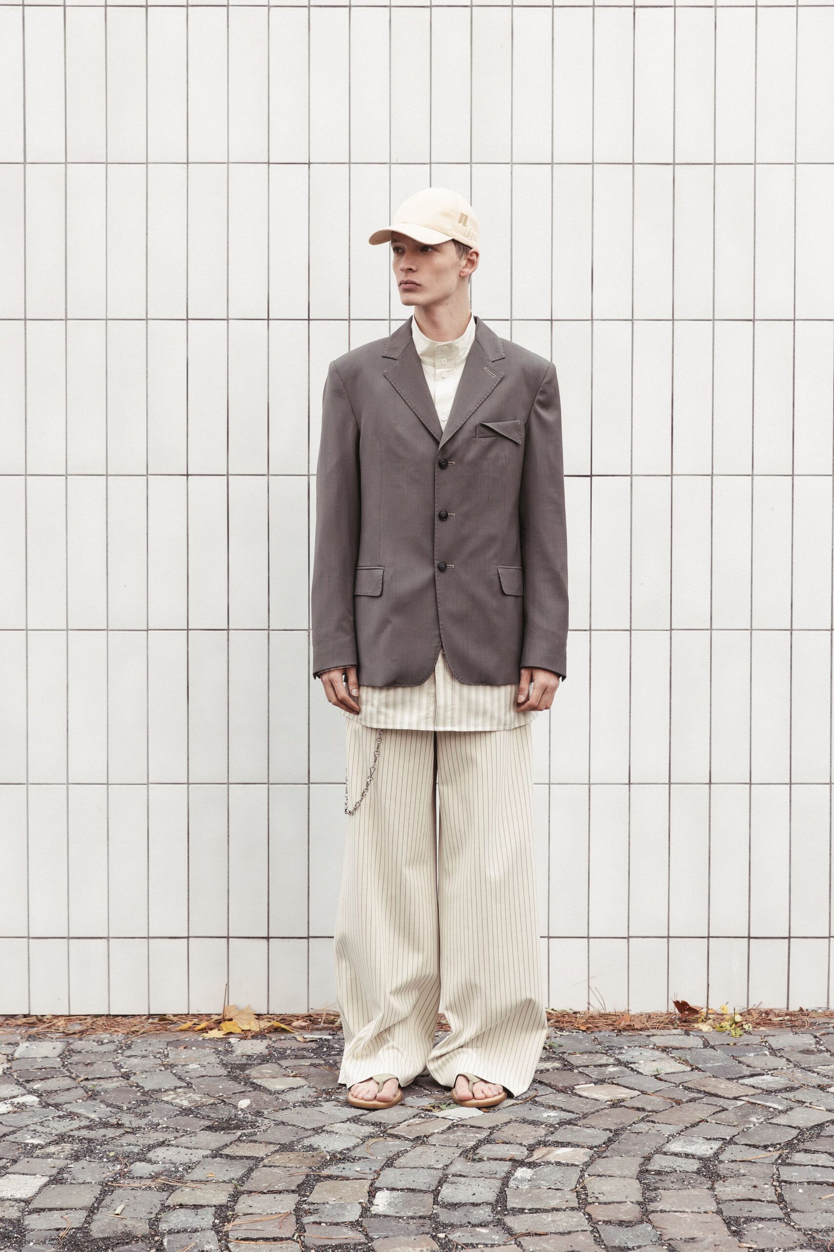 gray blazer with beige pants