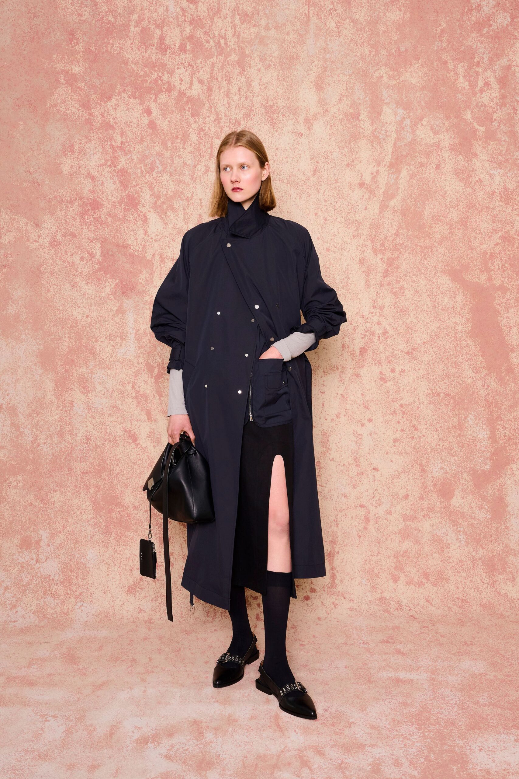 black cotton long-sleeve collared relaxed zippered pockets coat