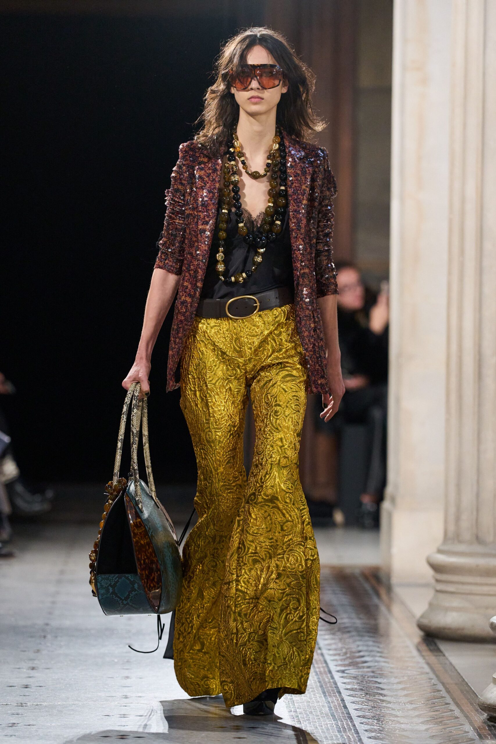 brown sequined blazer with yellow flared pants