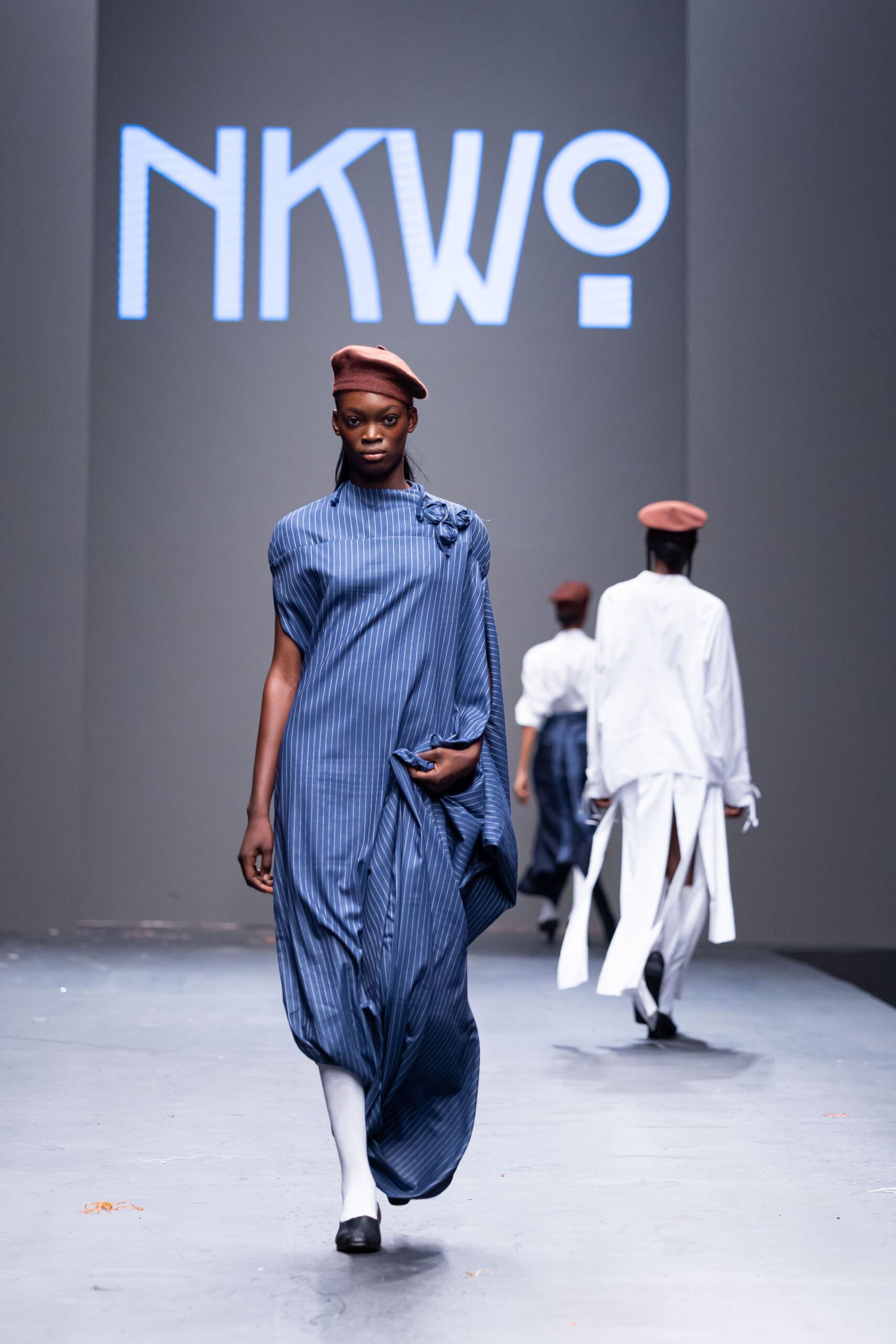 blue pleated midi dress with hat