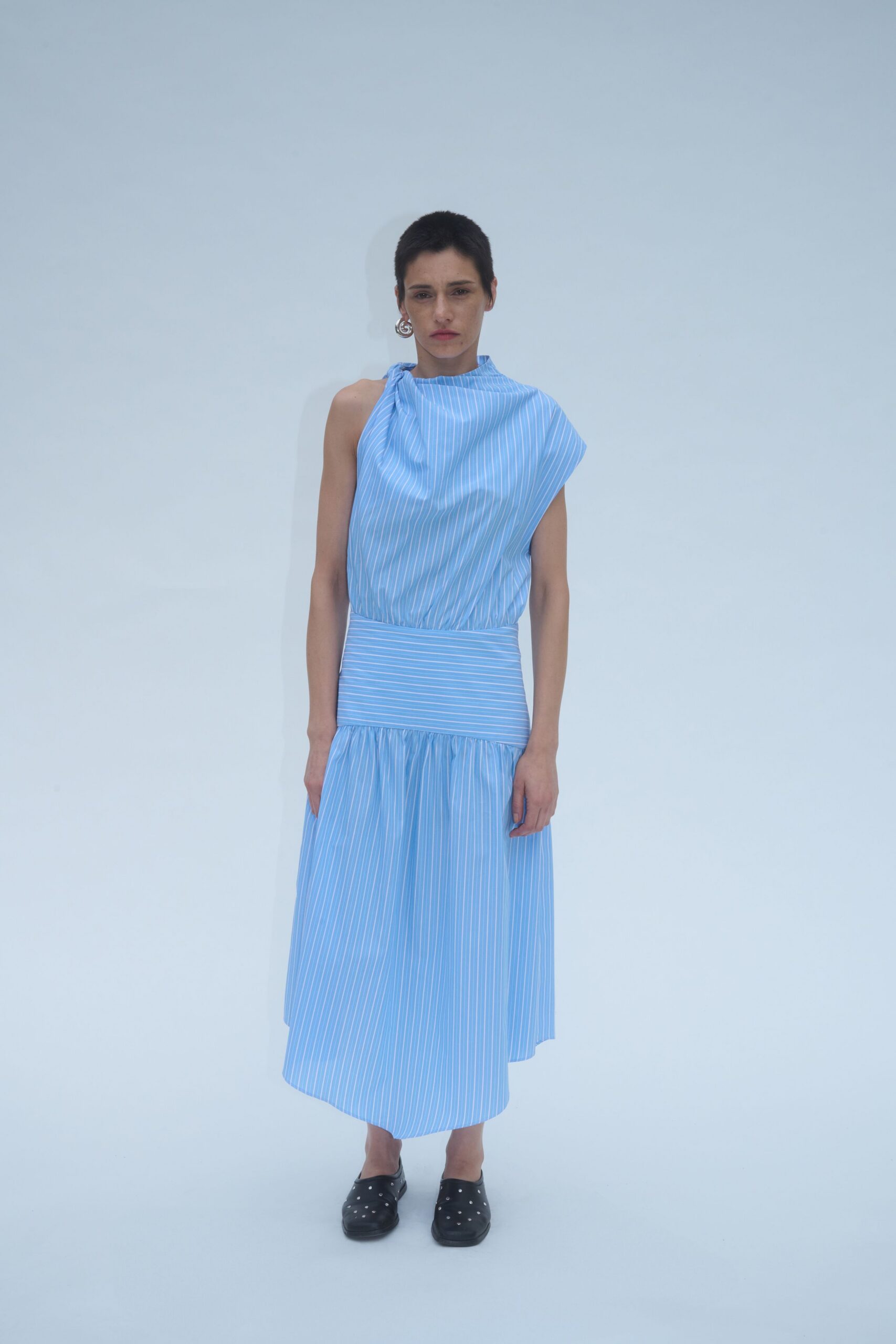 blue striped midi dress with black shoes