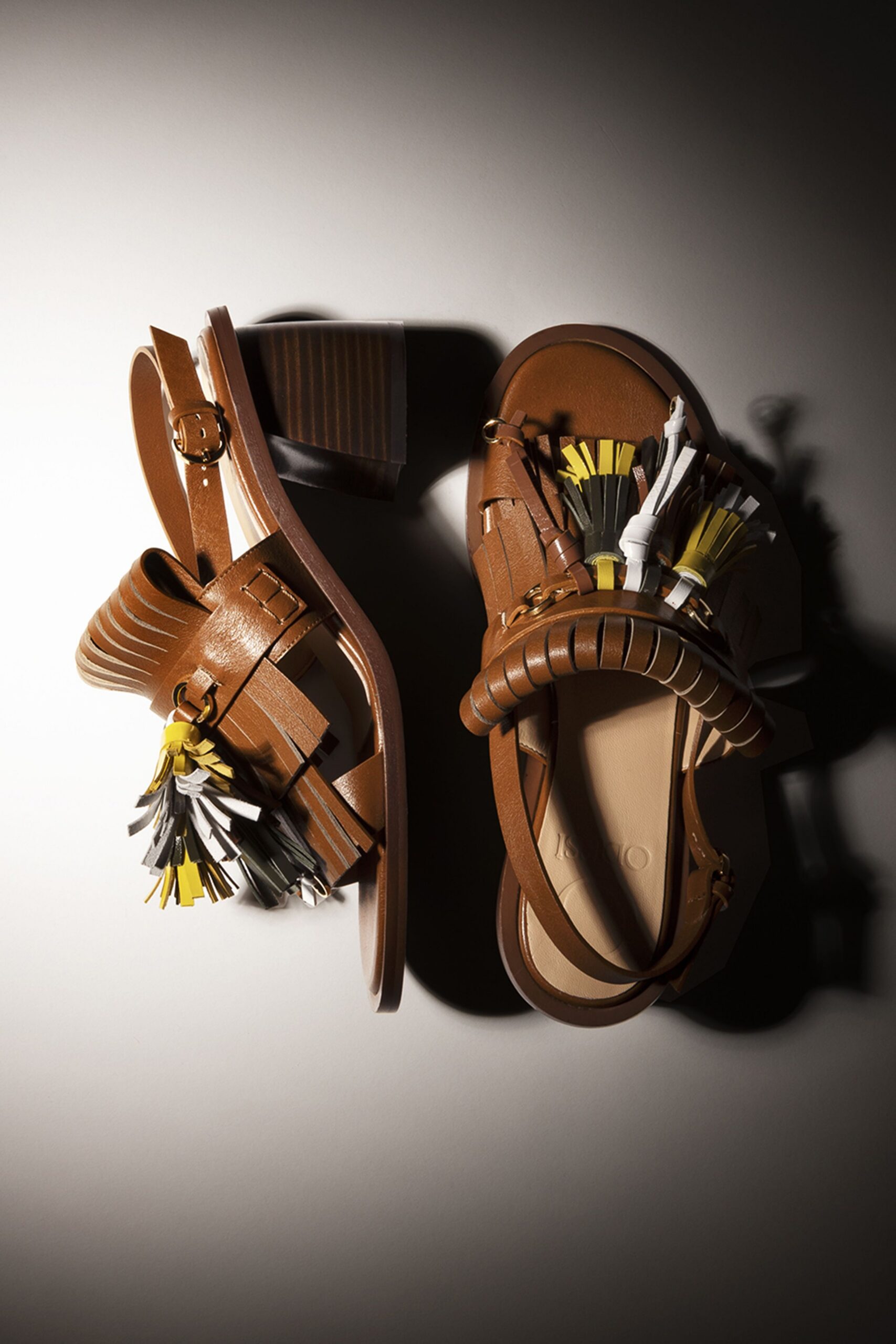 brown leather fringed shoes