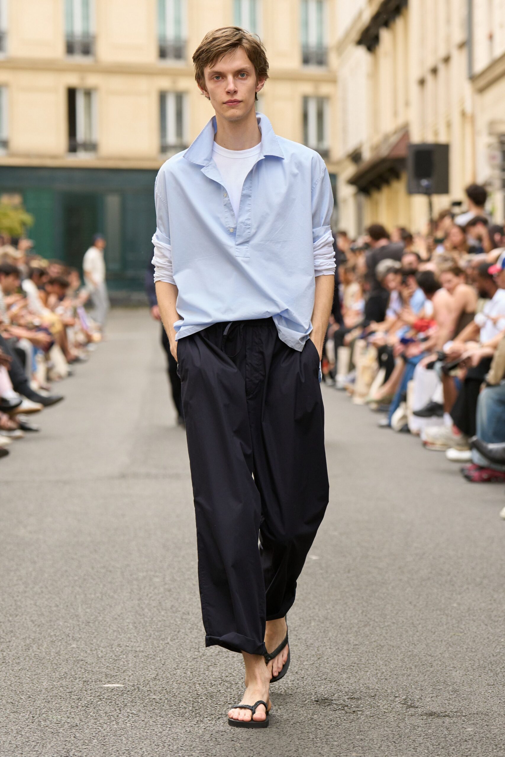light blue shirt black pants sandals