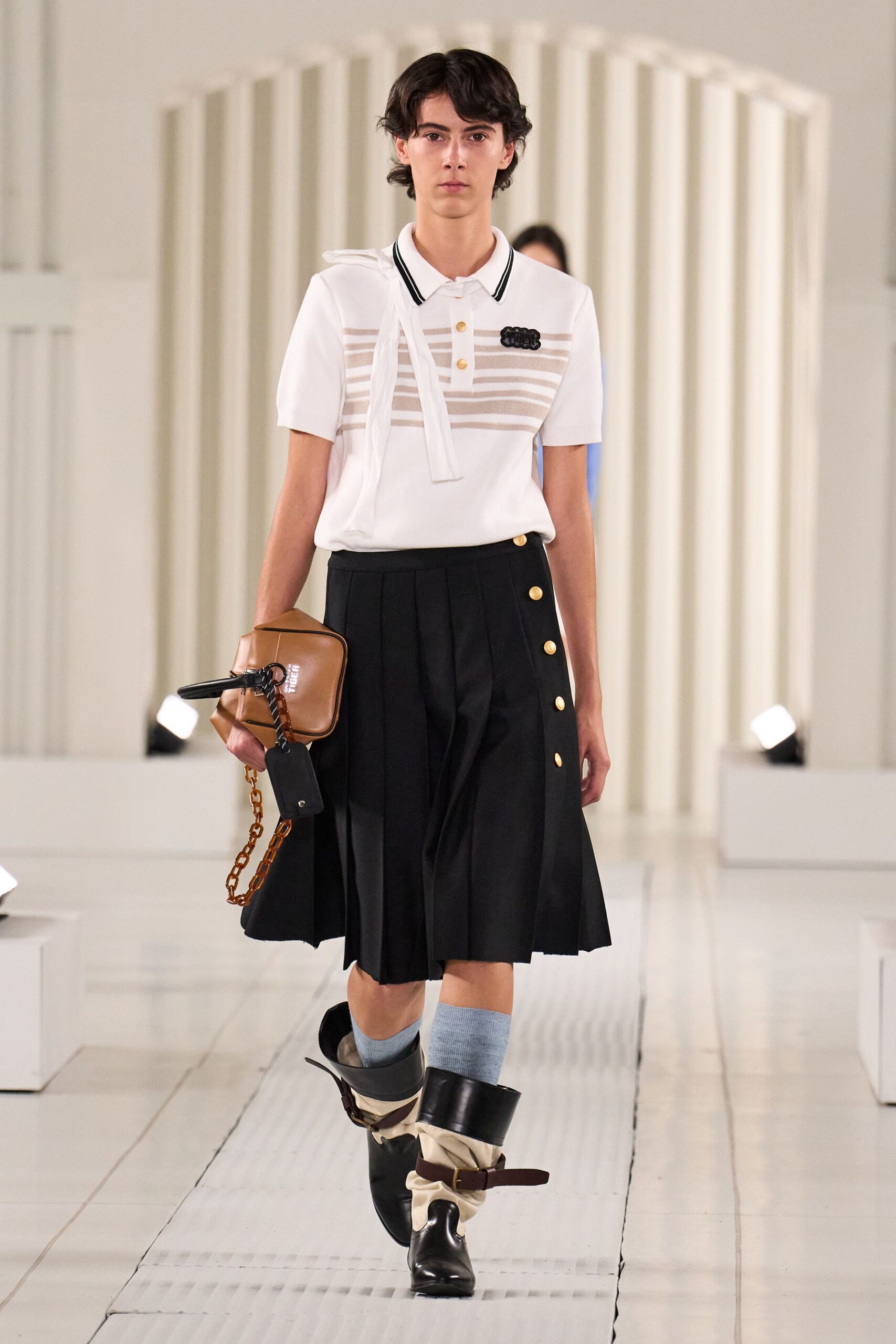 white fitted shirt black pleated skirt