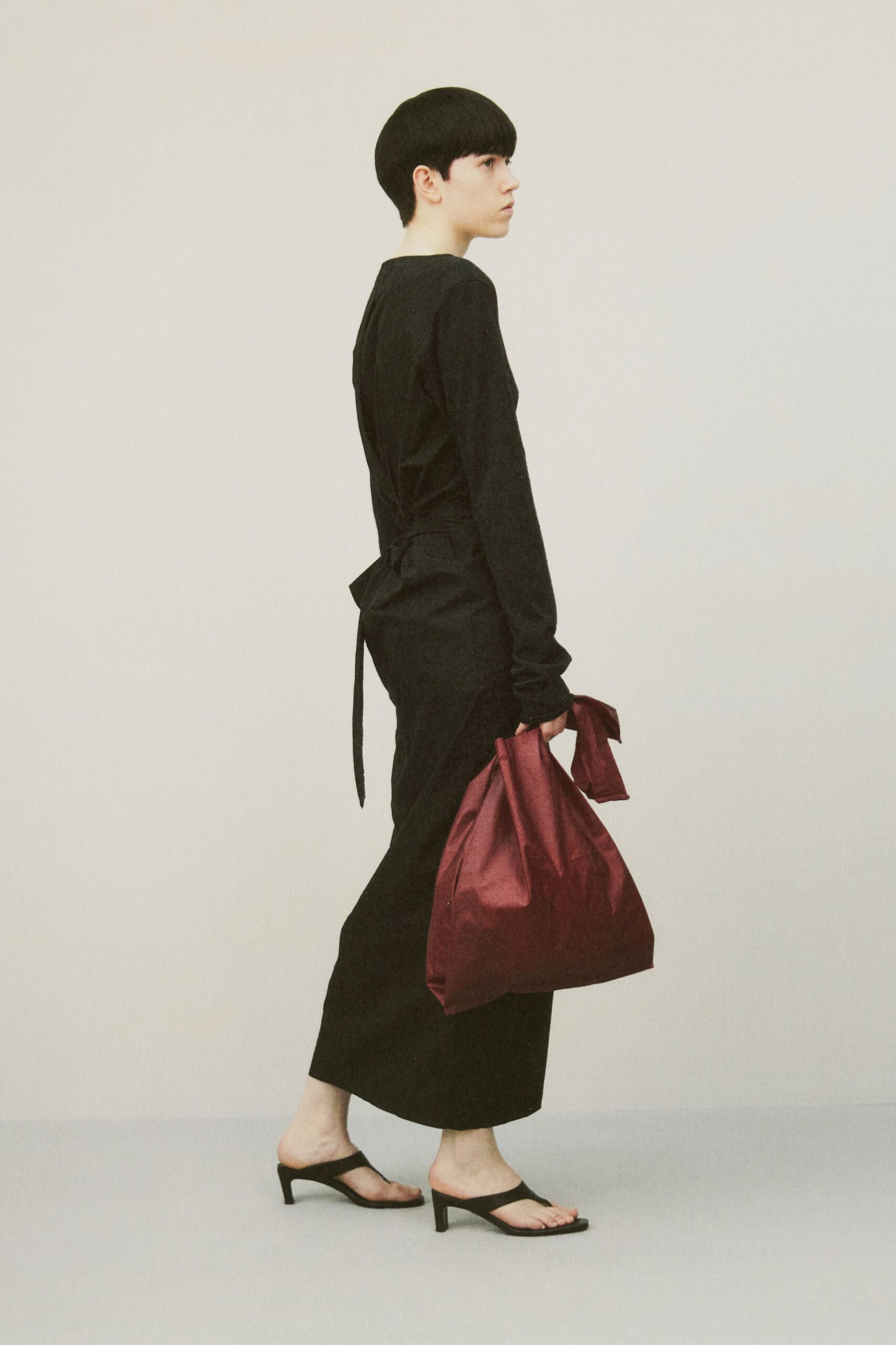 black fitted long-sleeve dress