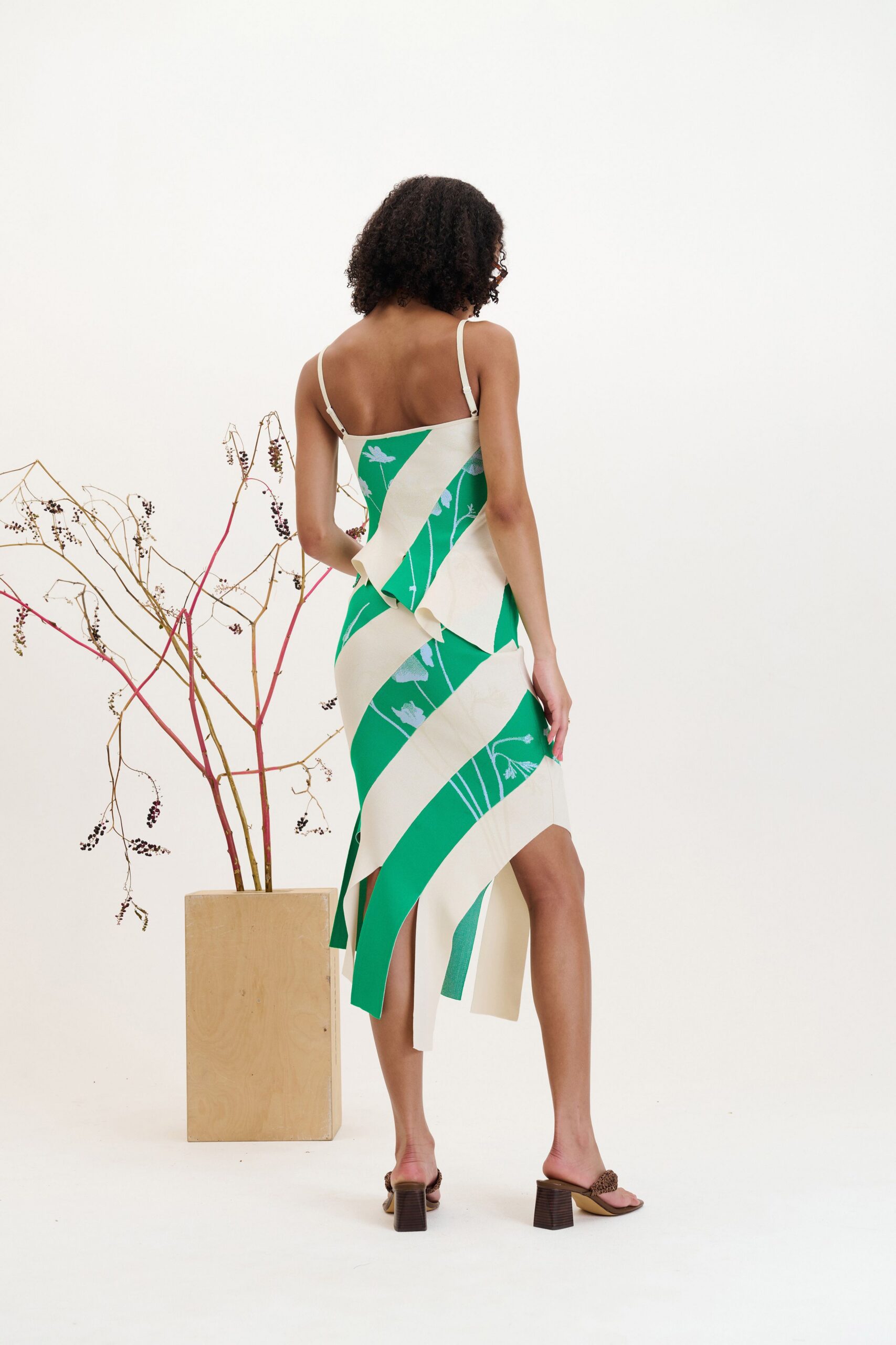 green silk sleeveless v-neck fitted printed midi dress