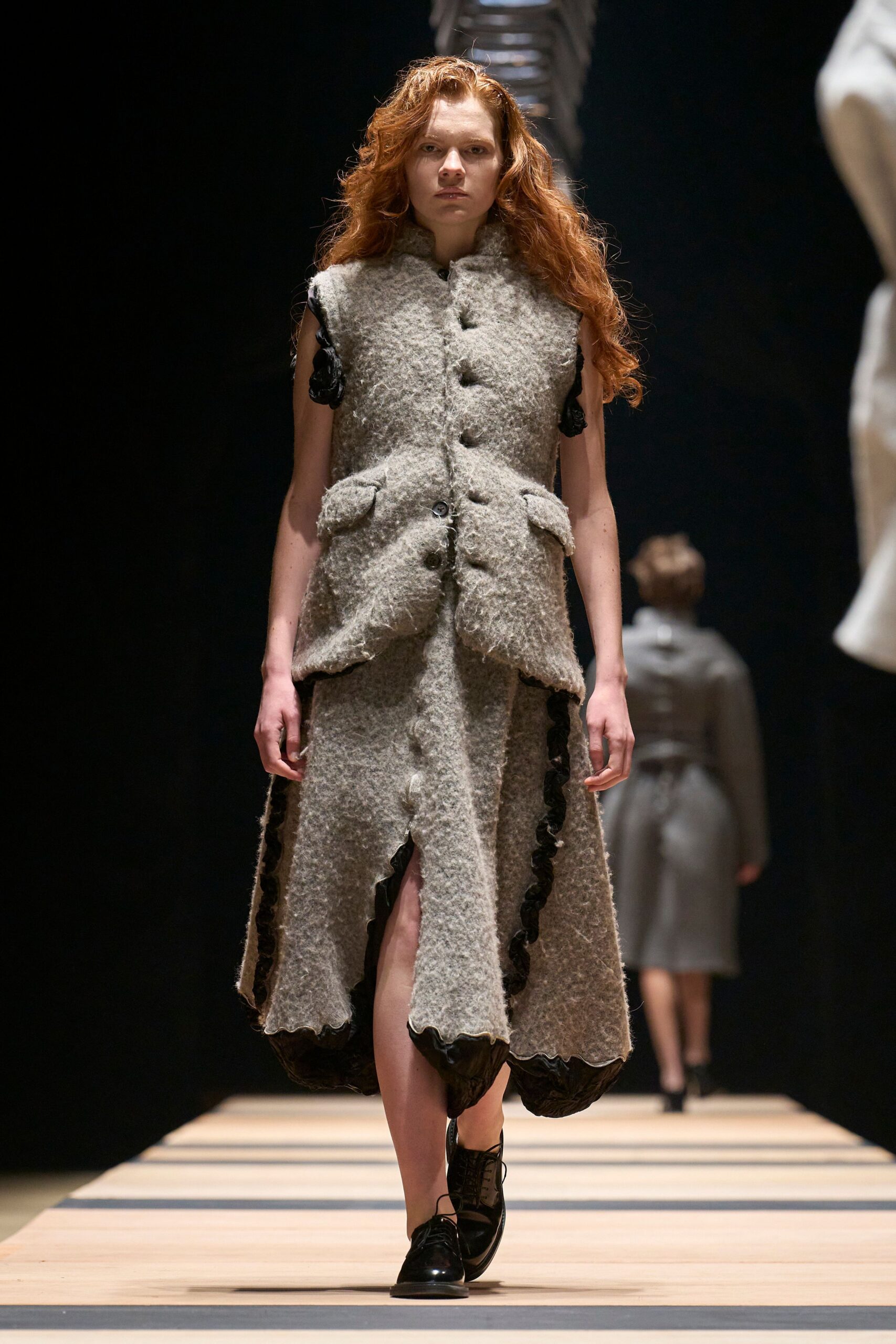 gray wool sleeveless v-neck fitted buttoned pleated dress