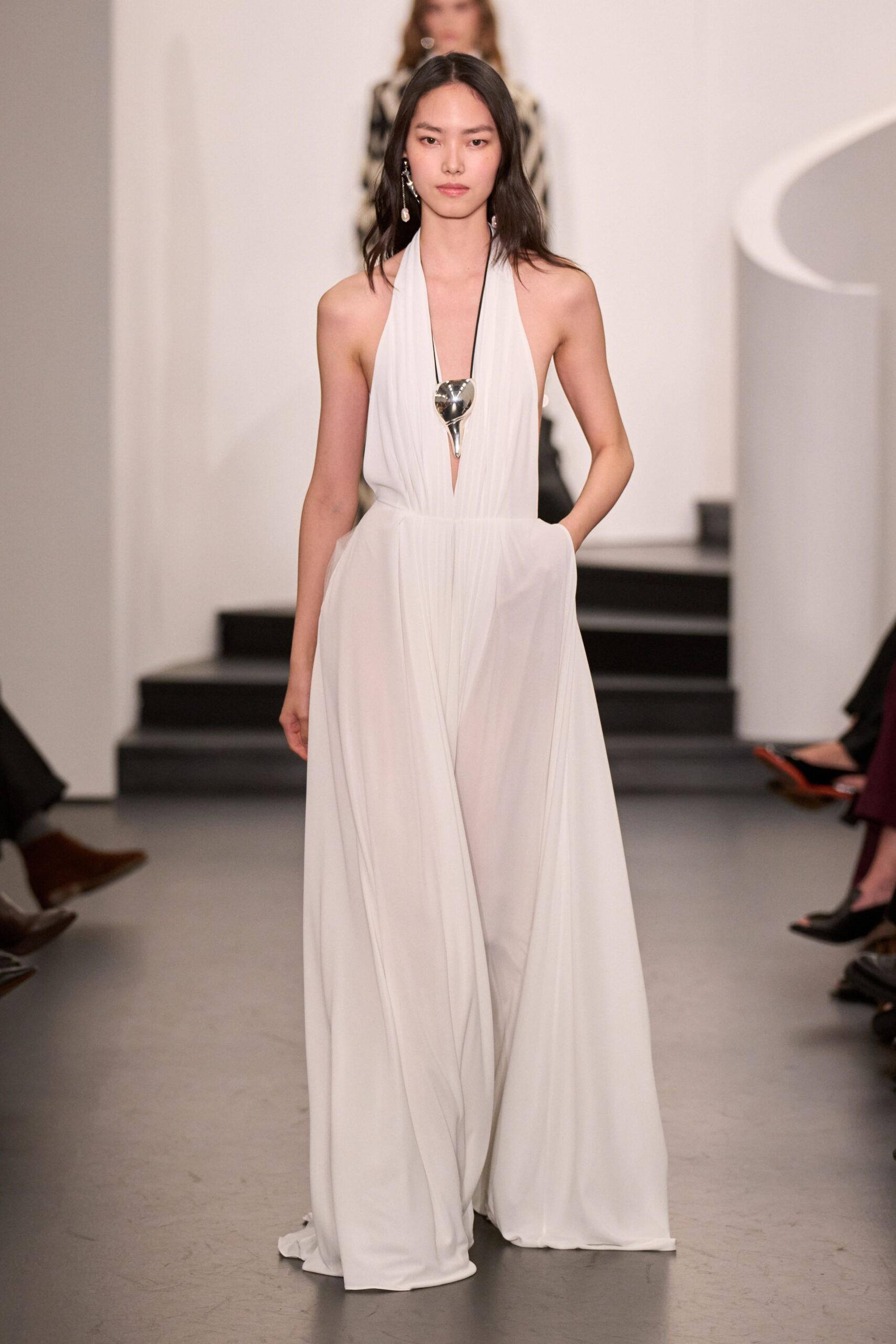 white chiffon sleeveless gown