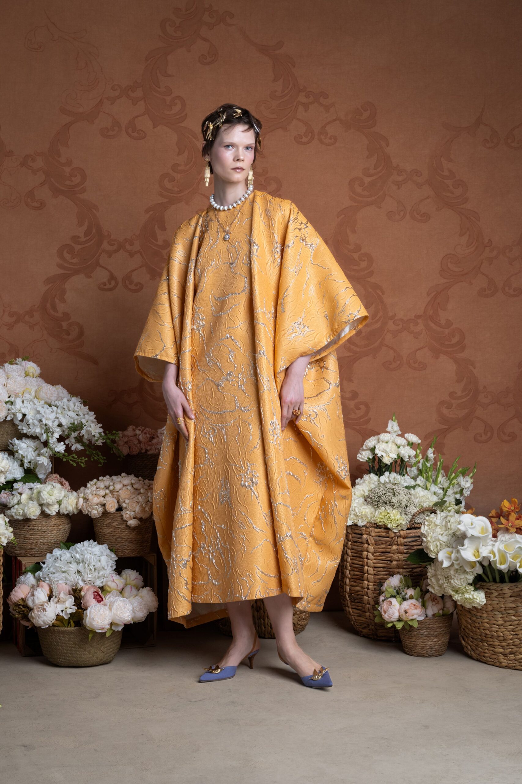 yellow embroidered maxi dress with blue shoes