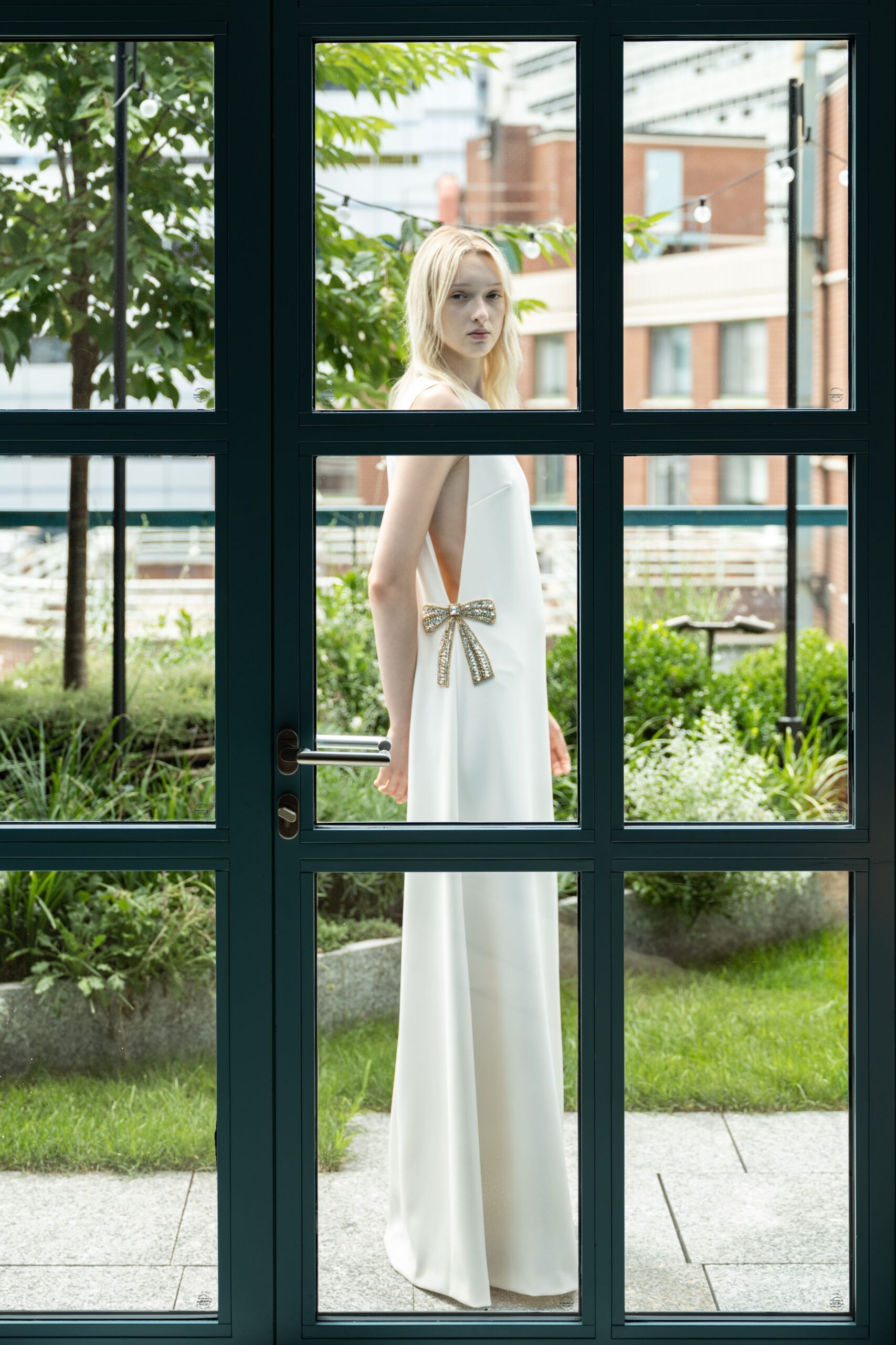 white silk sleeveless gown