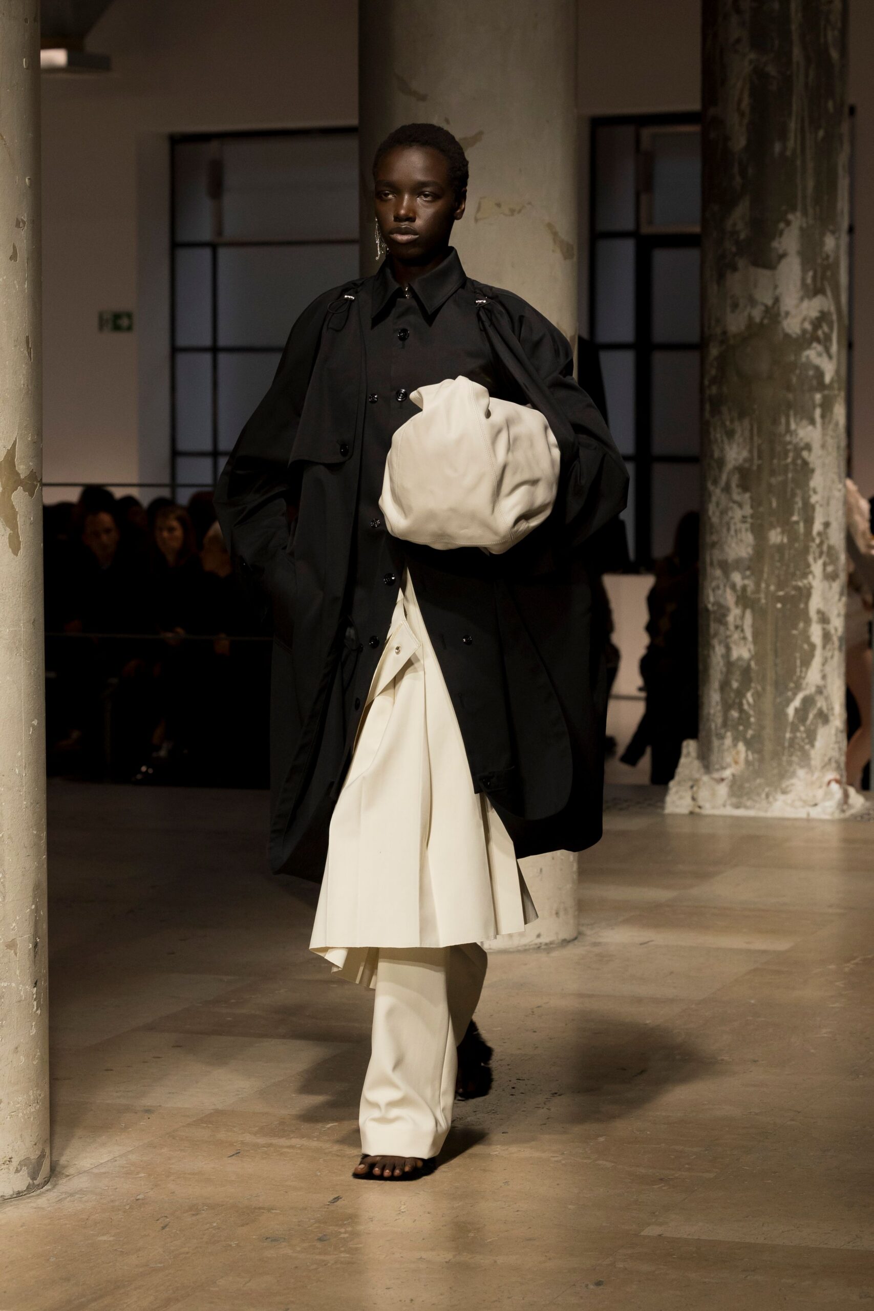 black coat white dress tailored pants