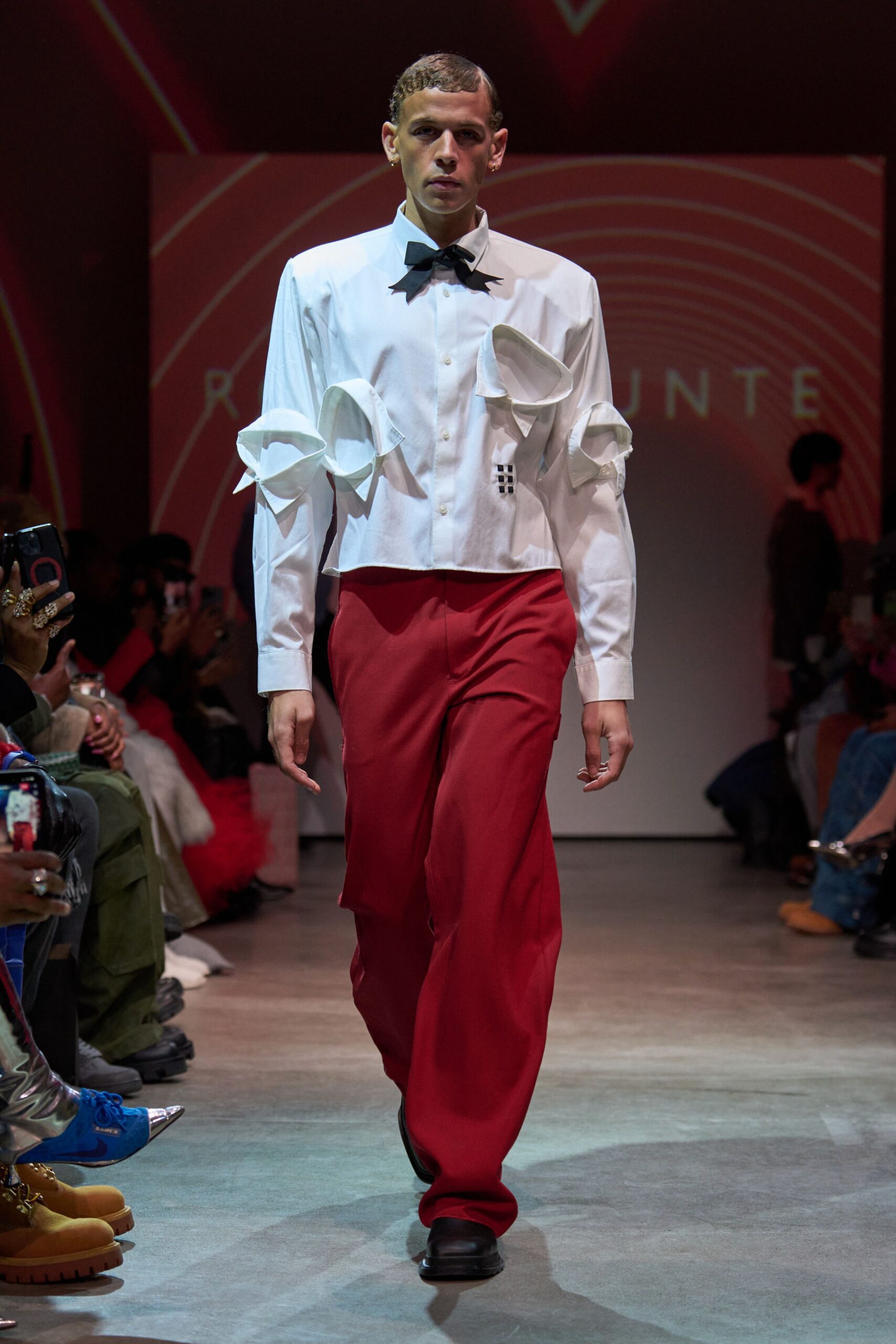 white shirt red pants
