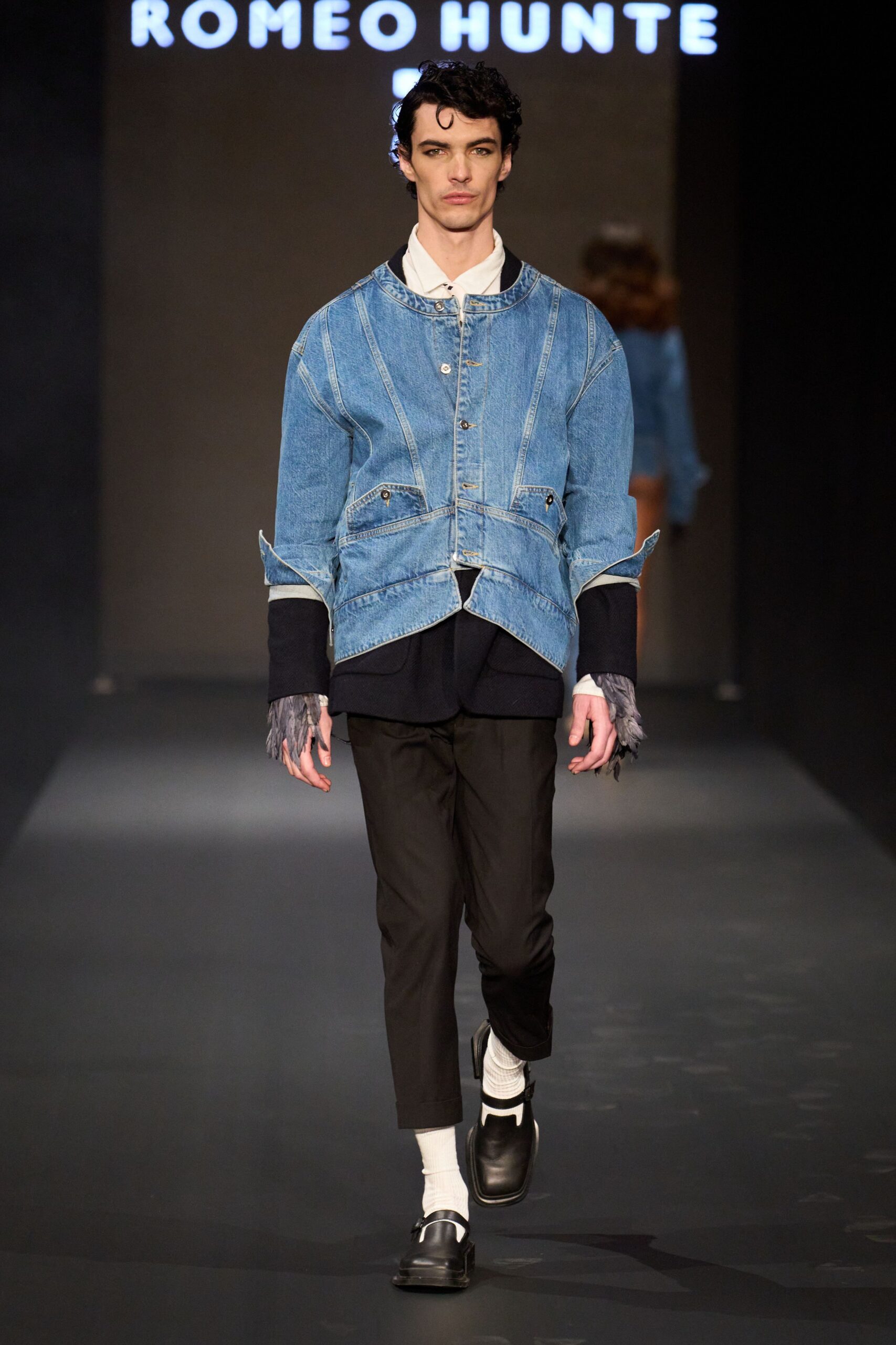 blue denim jacket with black shirt