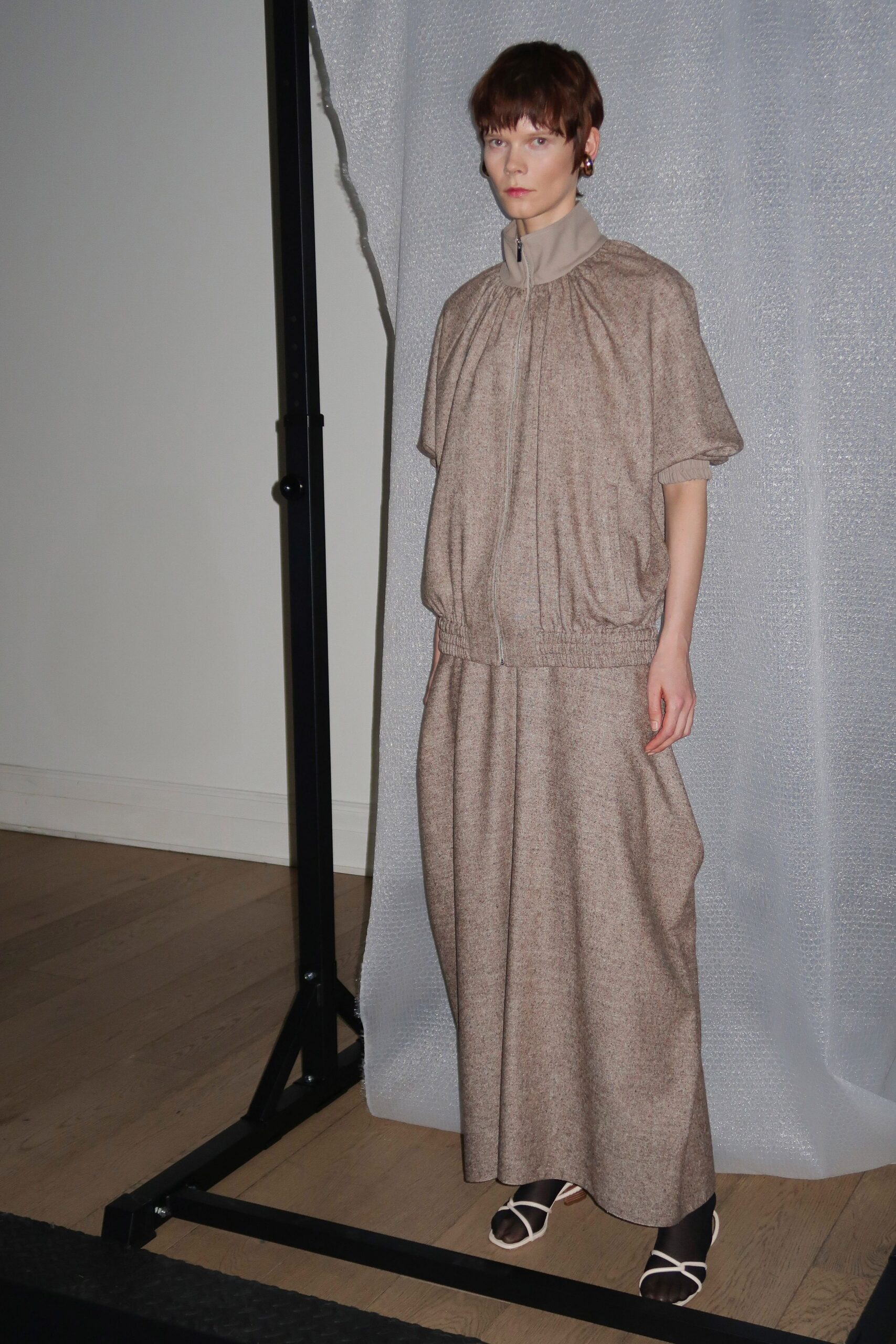 beige cotton short-sleeve high-neck relaxed pleated draped dress