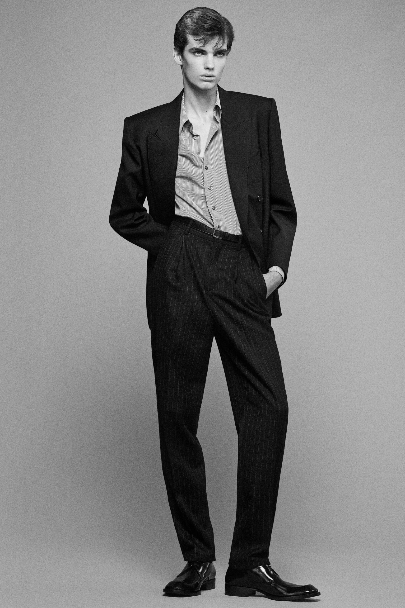 black tailored blazer gray shirt