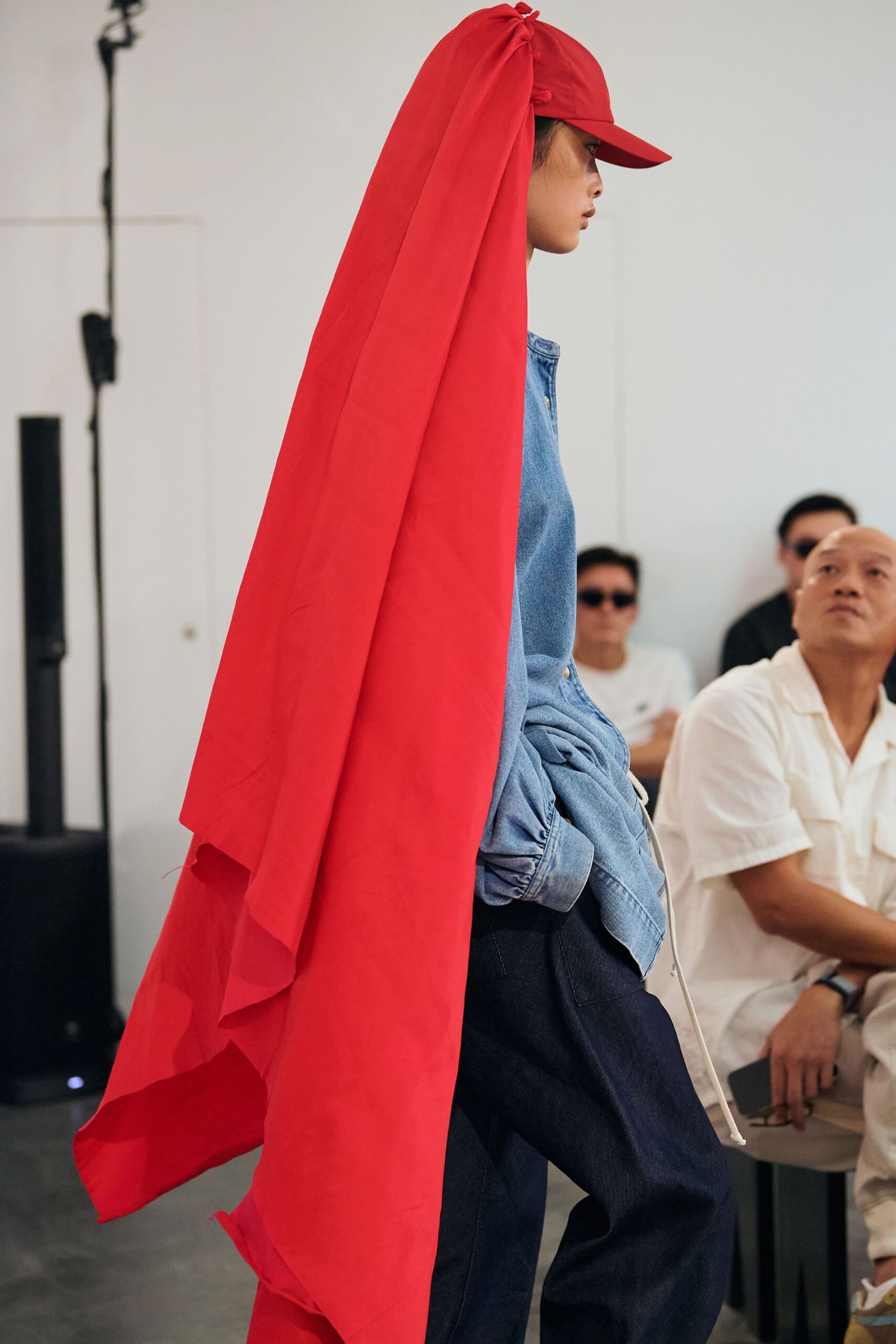 blue denim shirt with red cape