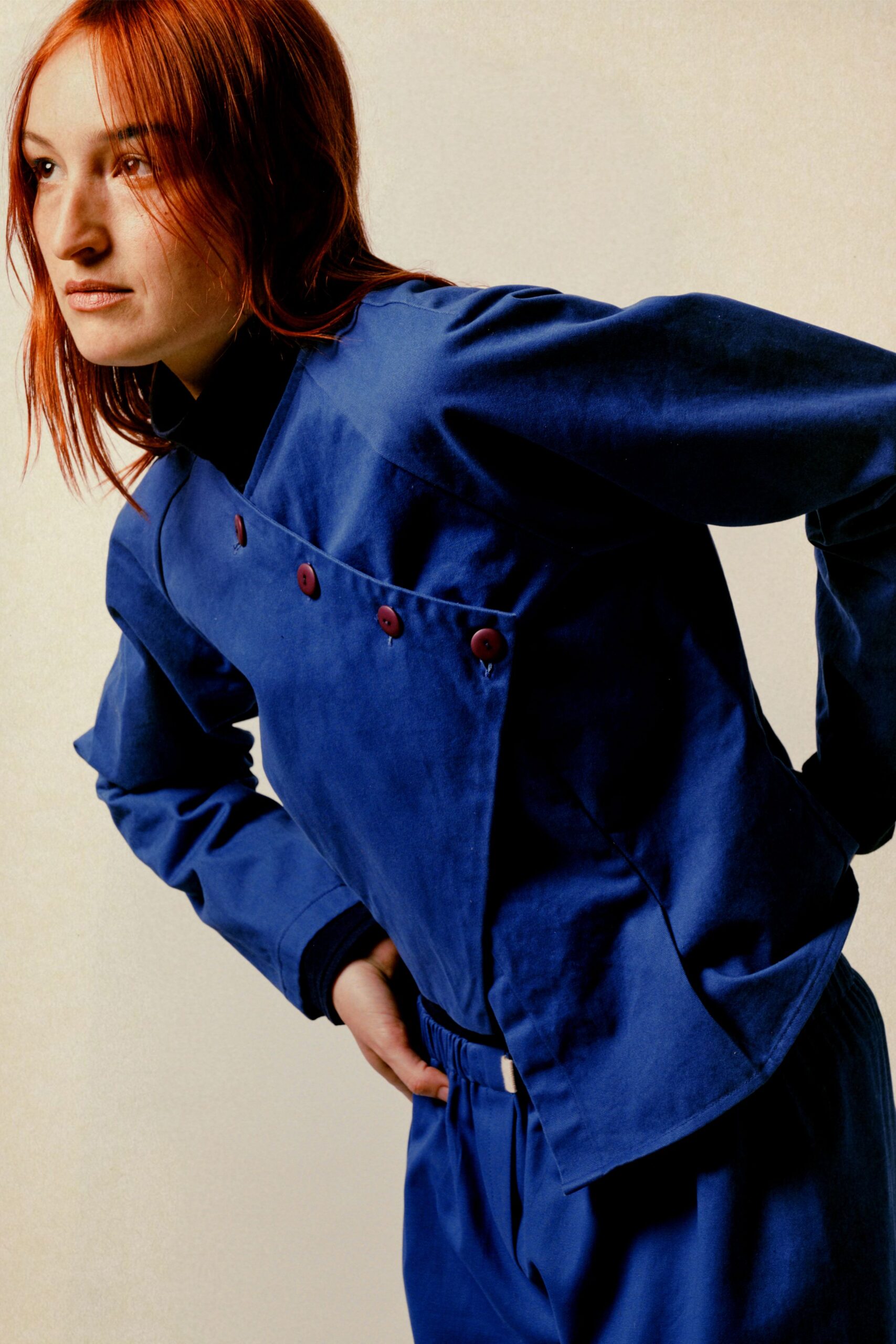 blue cotton long-sleeve collared fitted buttoned jacket