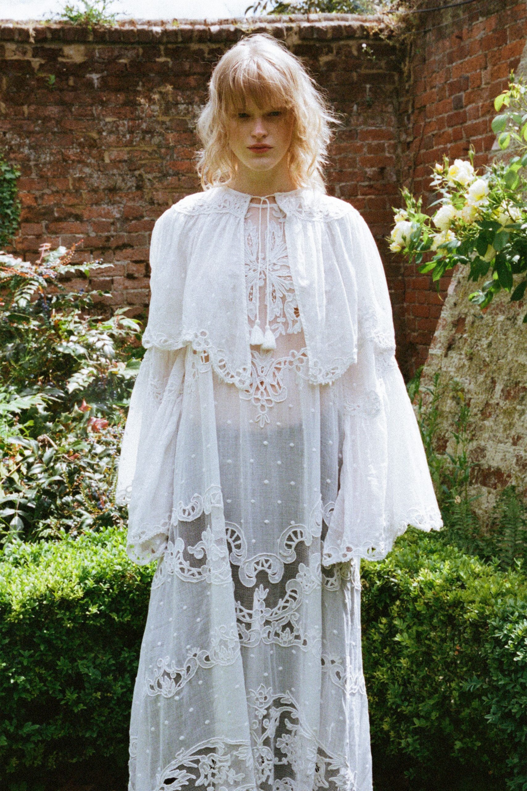 white lace long-sleeve high-neck fitted embroidered layered gown