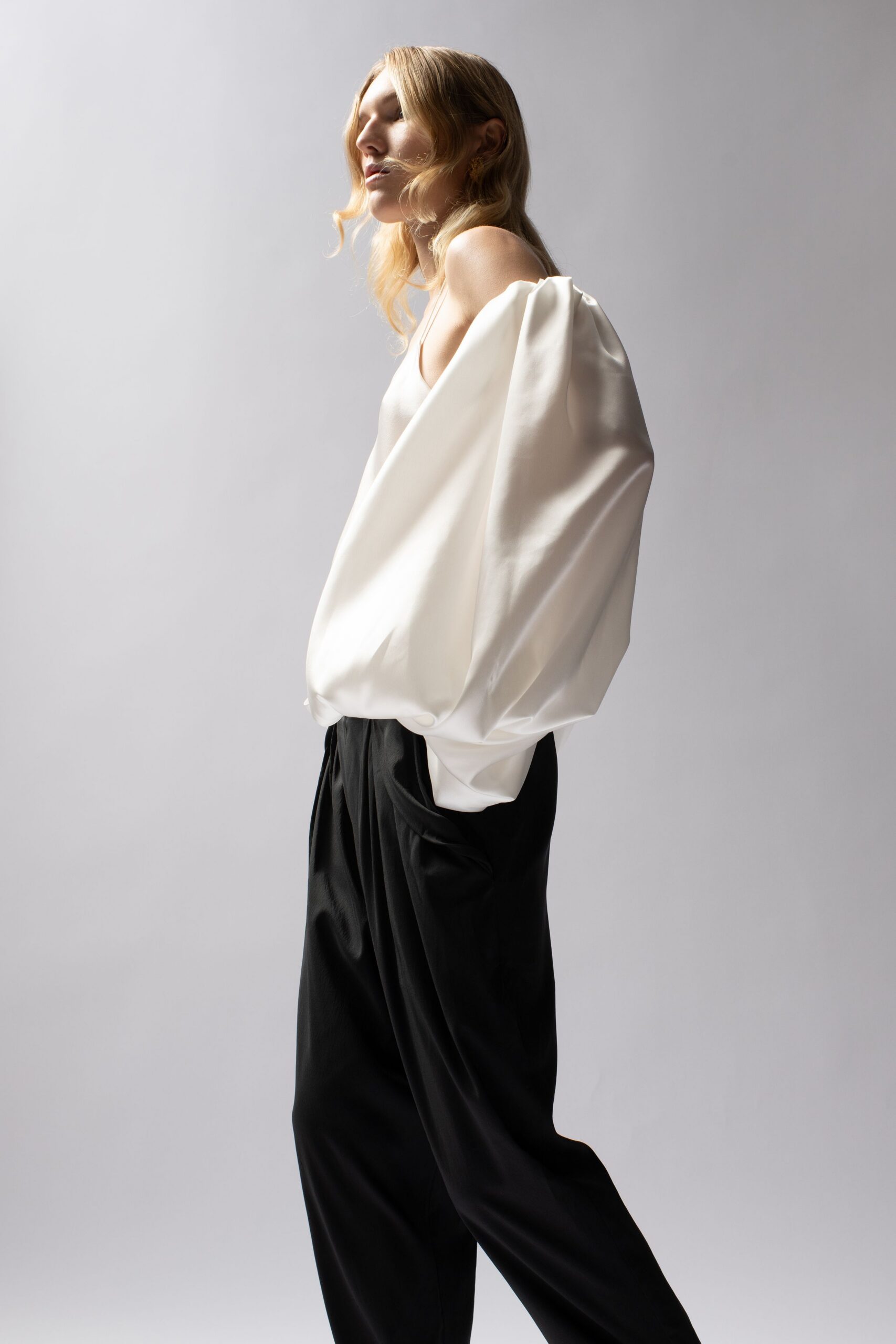 white silk sleeveless off-shoulder relaxed draped top