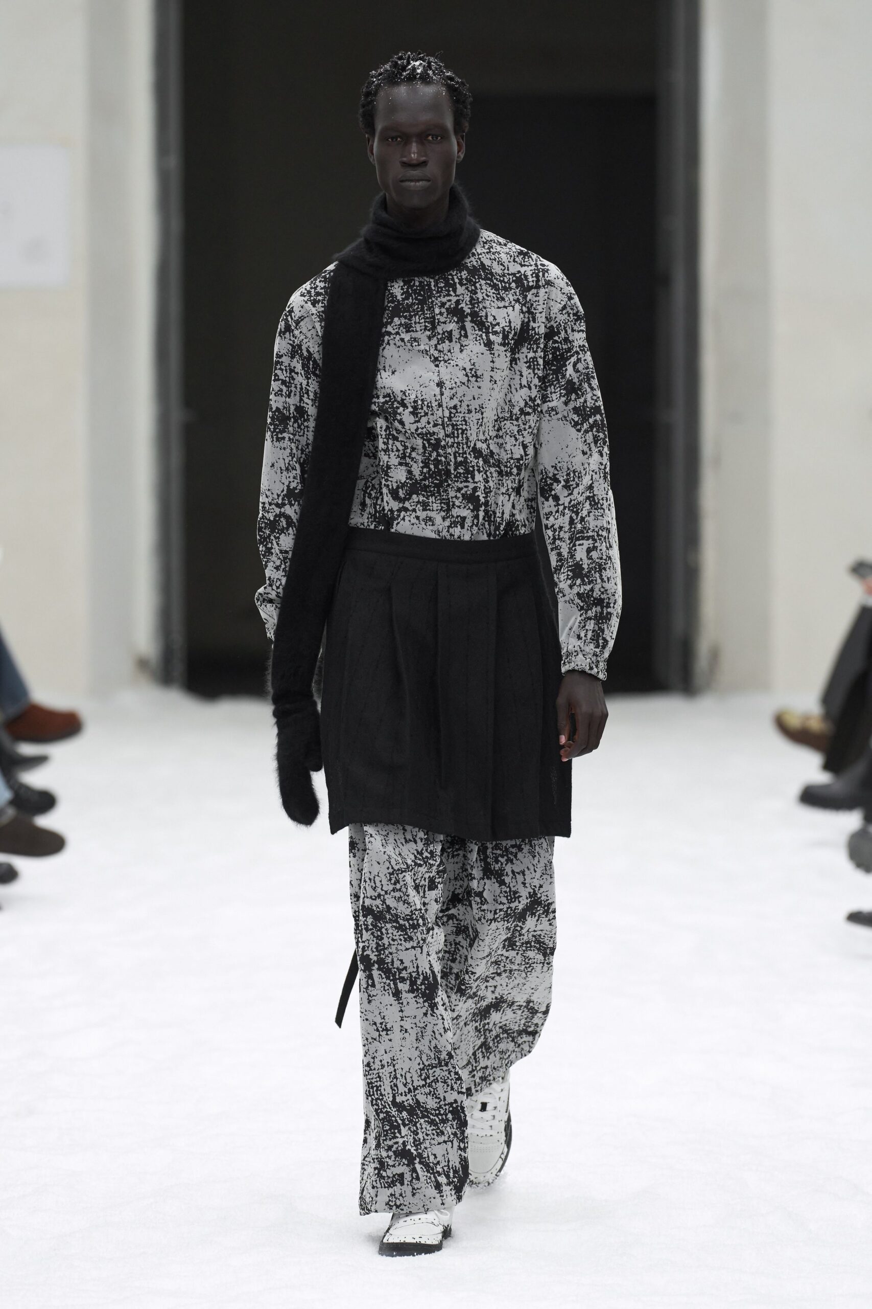 black and white printed shirt with pleated skirt