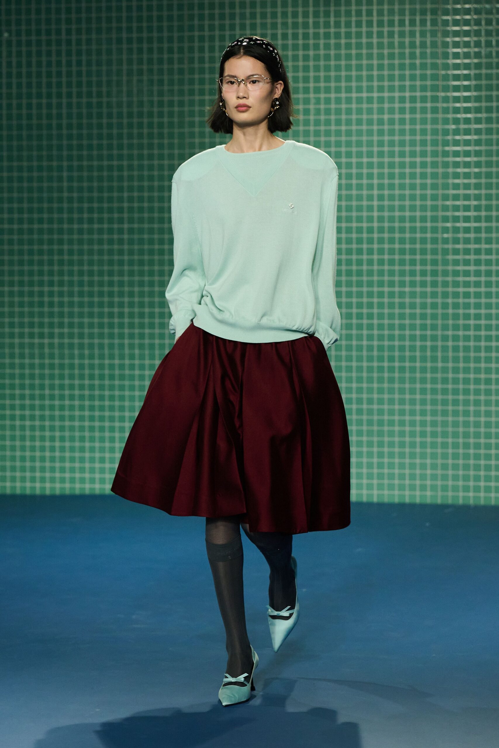 red silk fitted high-waisted pleated midi skirt