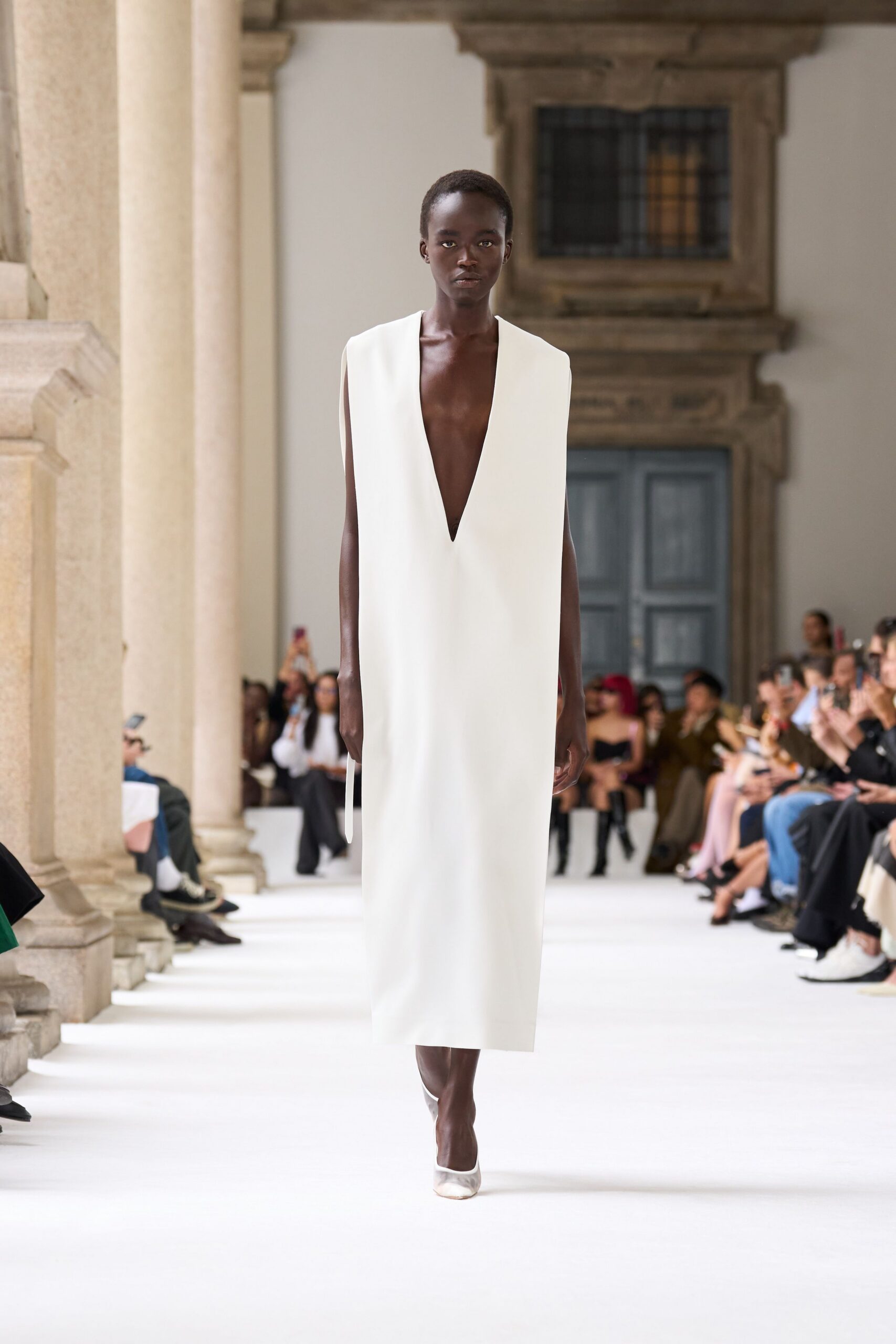 white silk sleeveless gown
