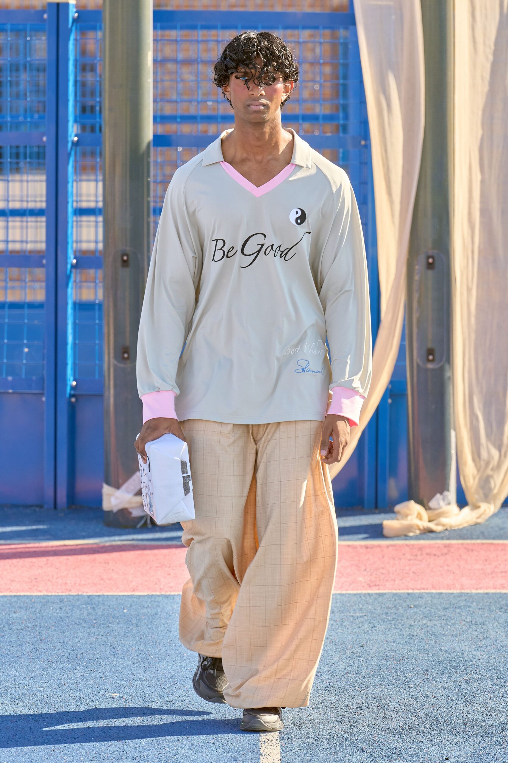 beige relaxed shirt with checked pants