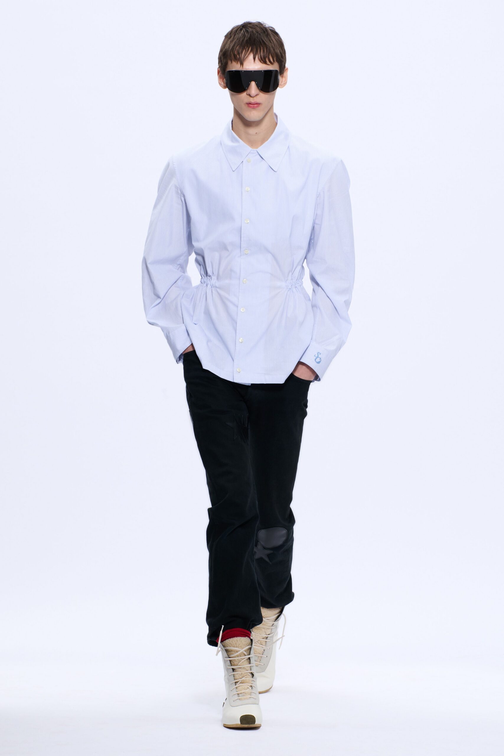 white blue fitted shirt with black pants