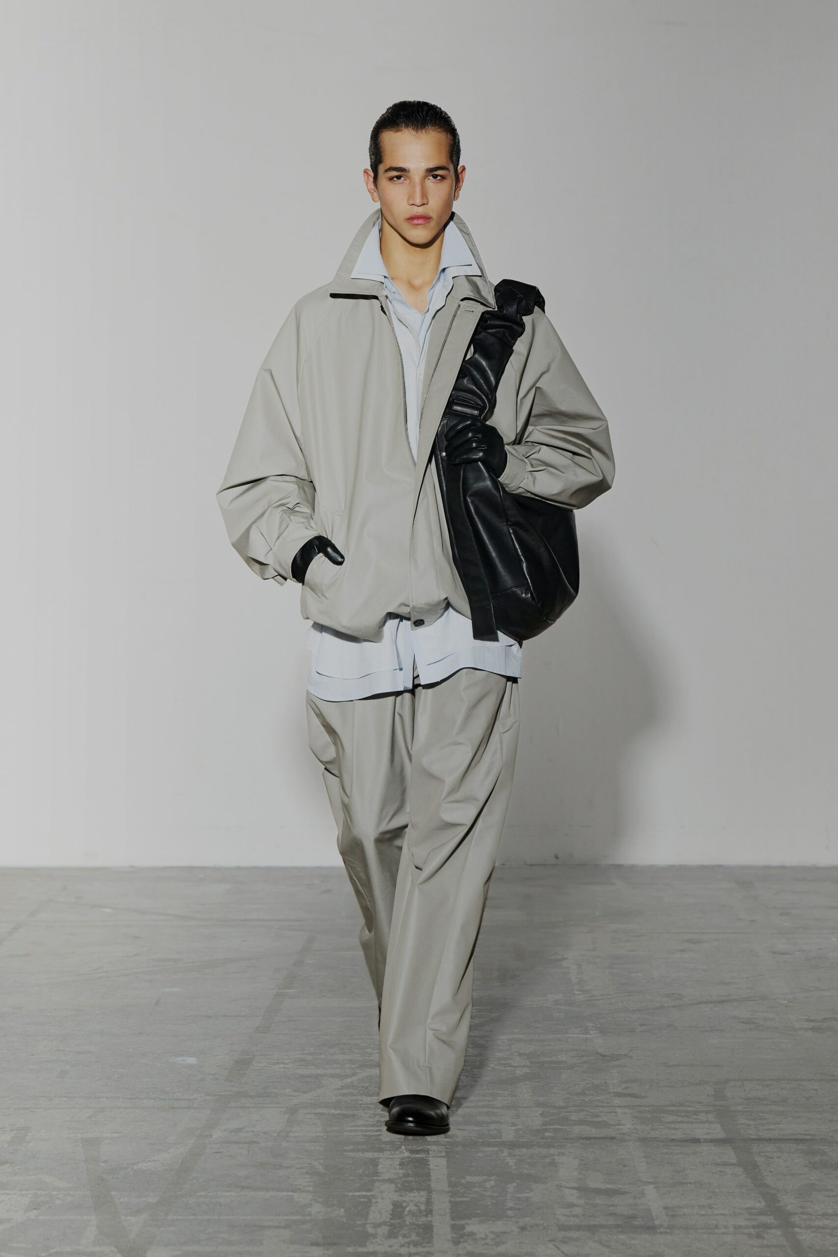 gray oversized jacket with black bag