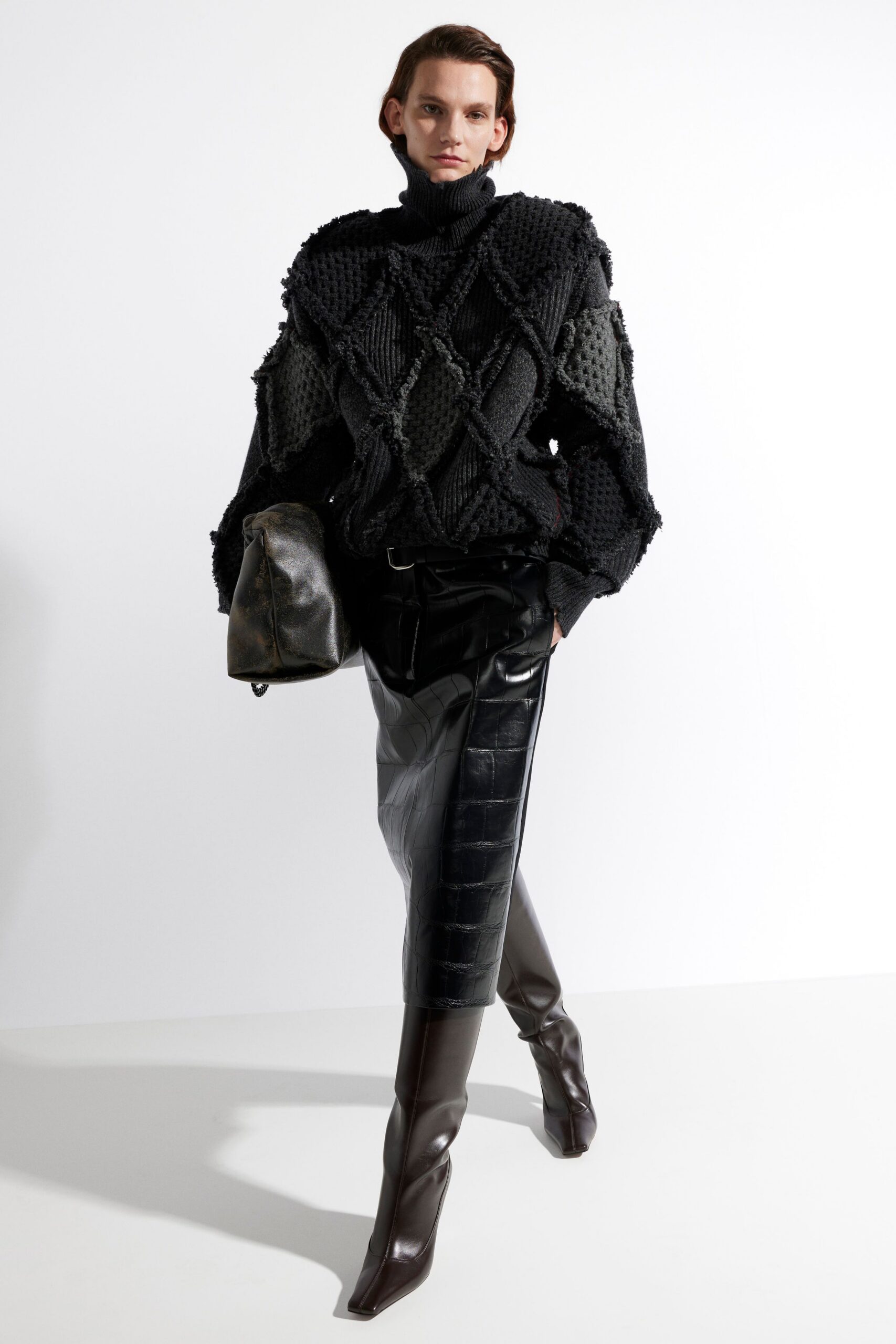 black wool fitted top with leather skirt
