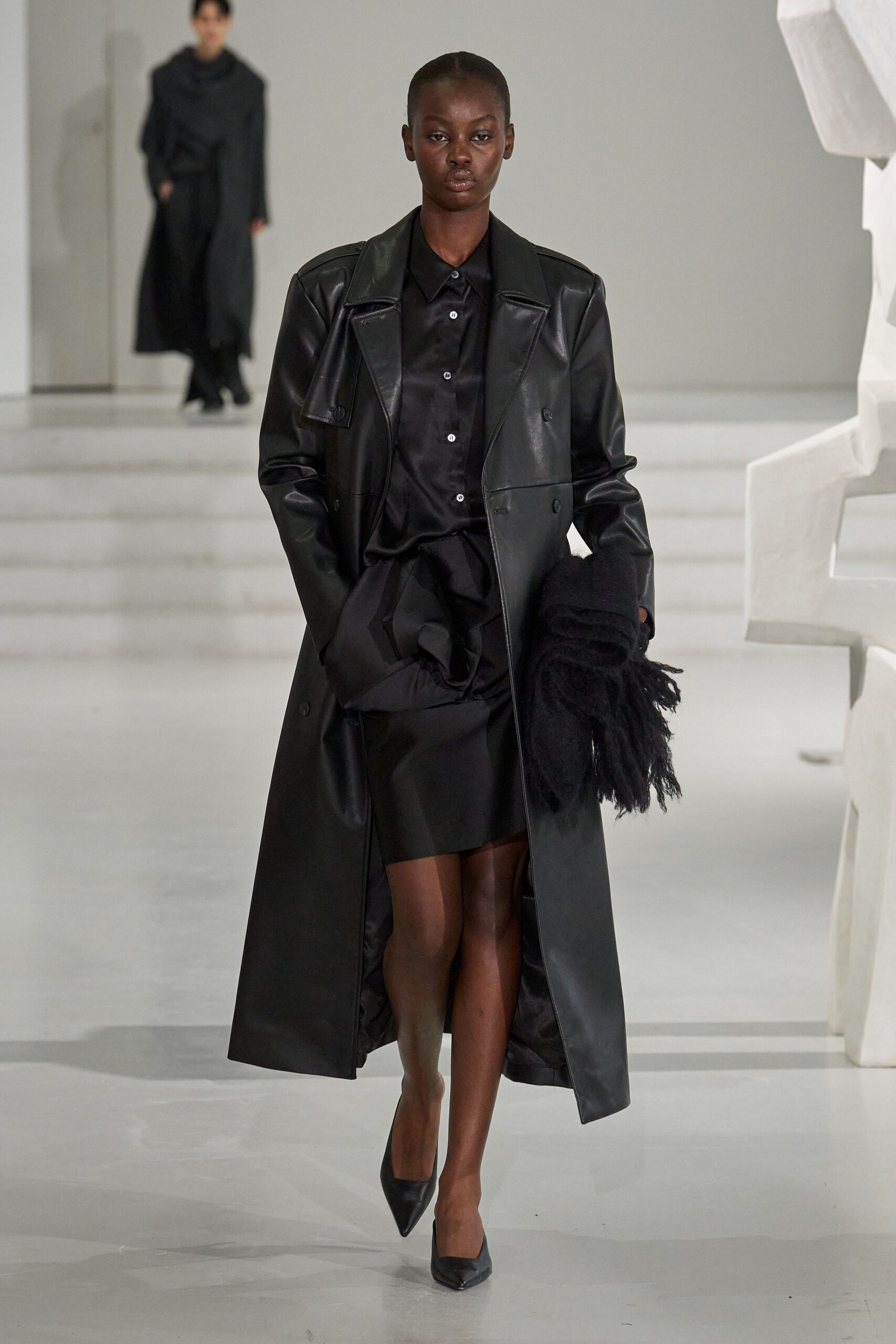 black leather coat and outfit