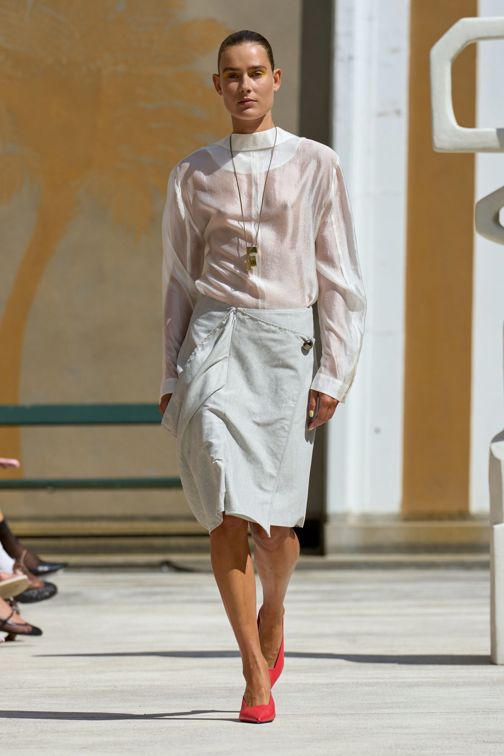 white silk shirt gray skirt pink heels