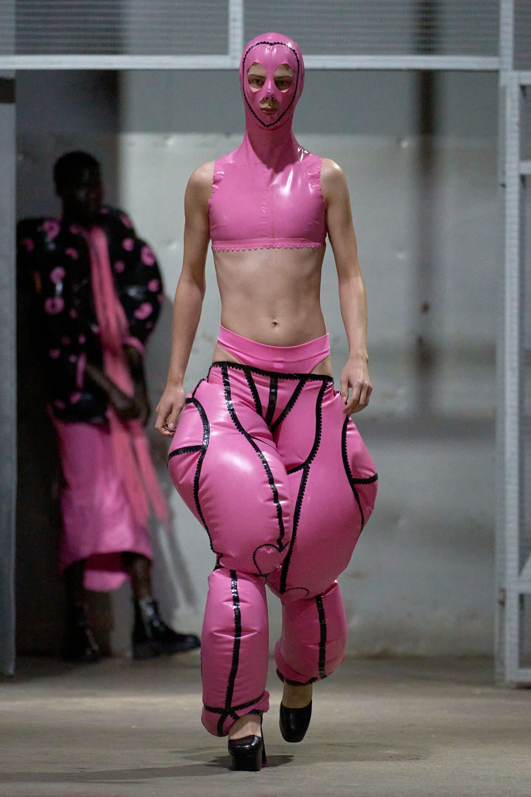 pink vinyl sleeveless high-neck fitted top