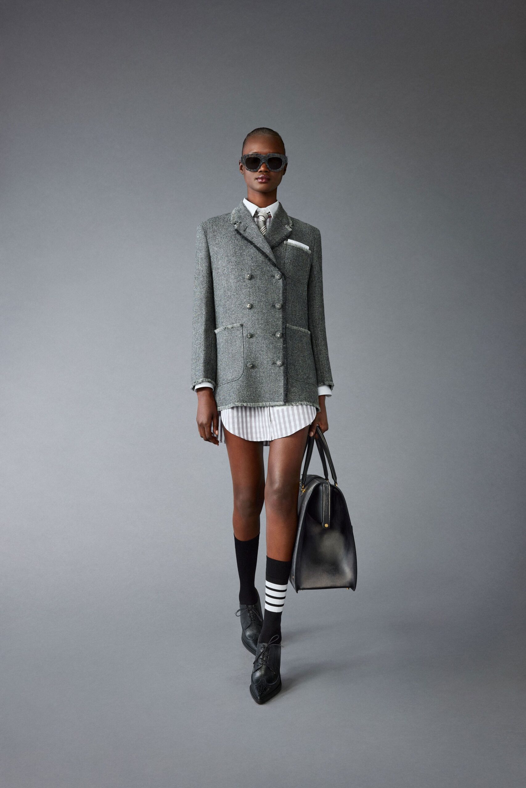 gray tweed long-sleeve collared structured buttoned pockets blazer