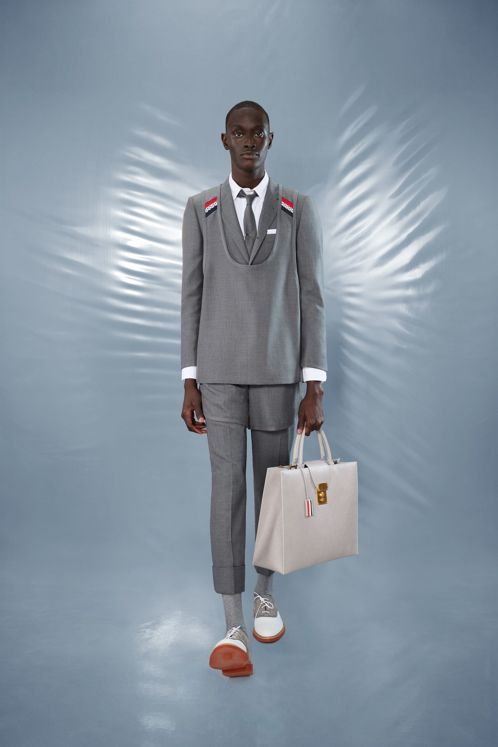 gray tailored suit with leather shoes