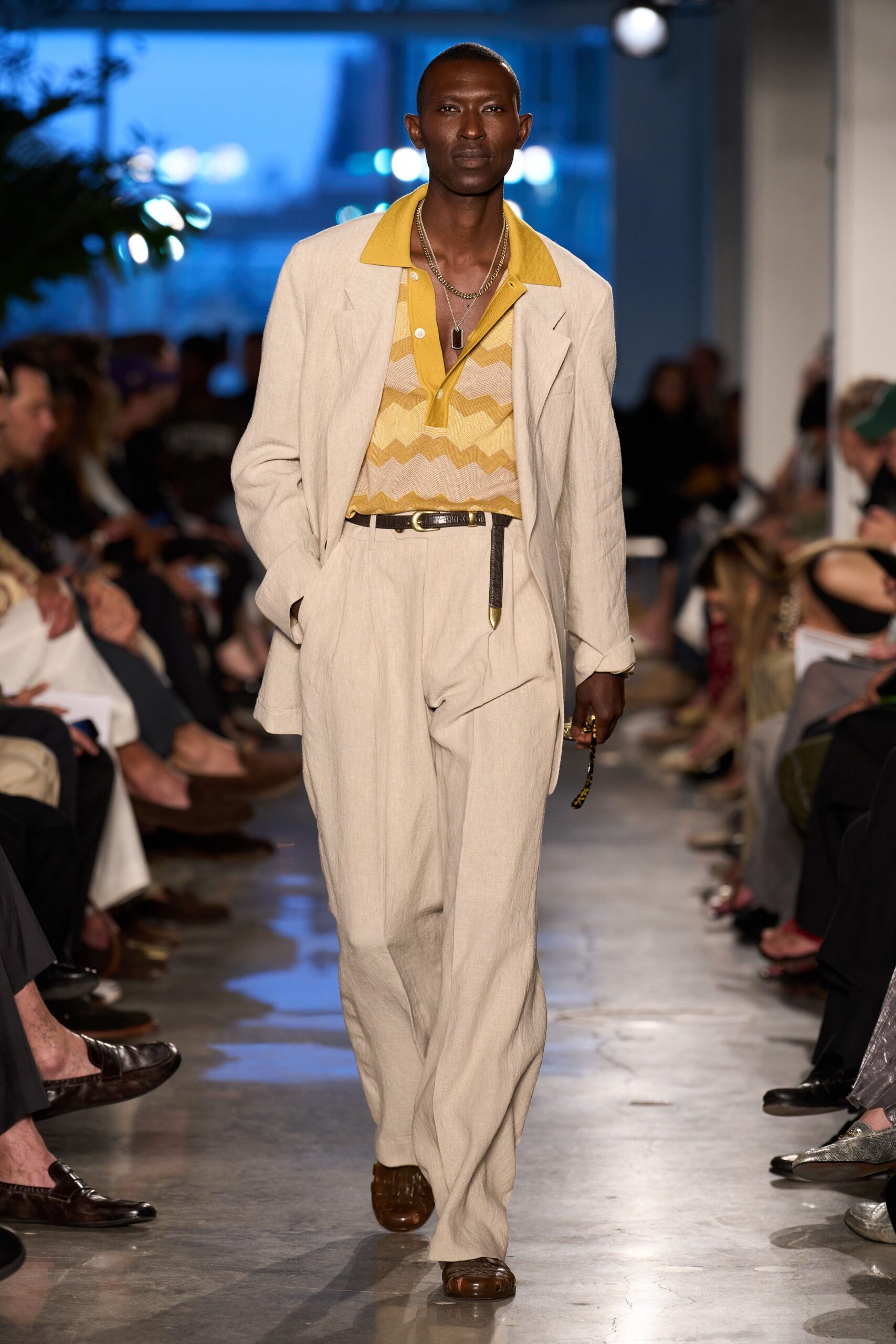 beige linen suit with yellow shirt