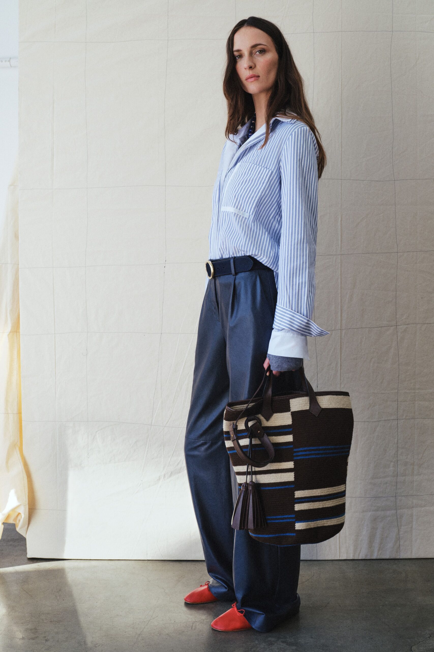 blue striped shirt with tailored pants