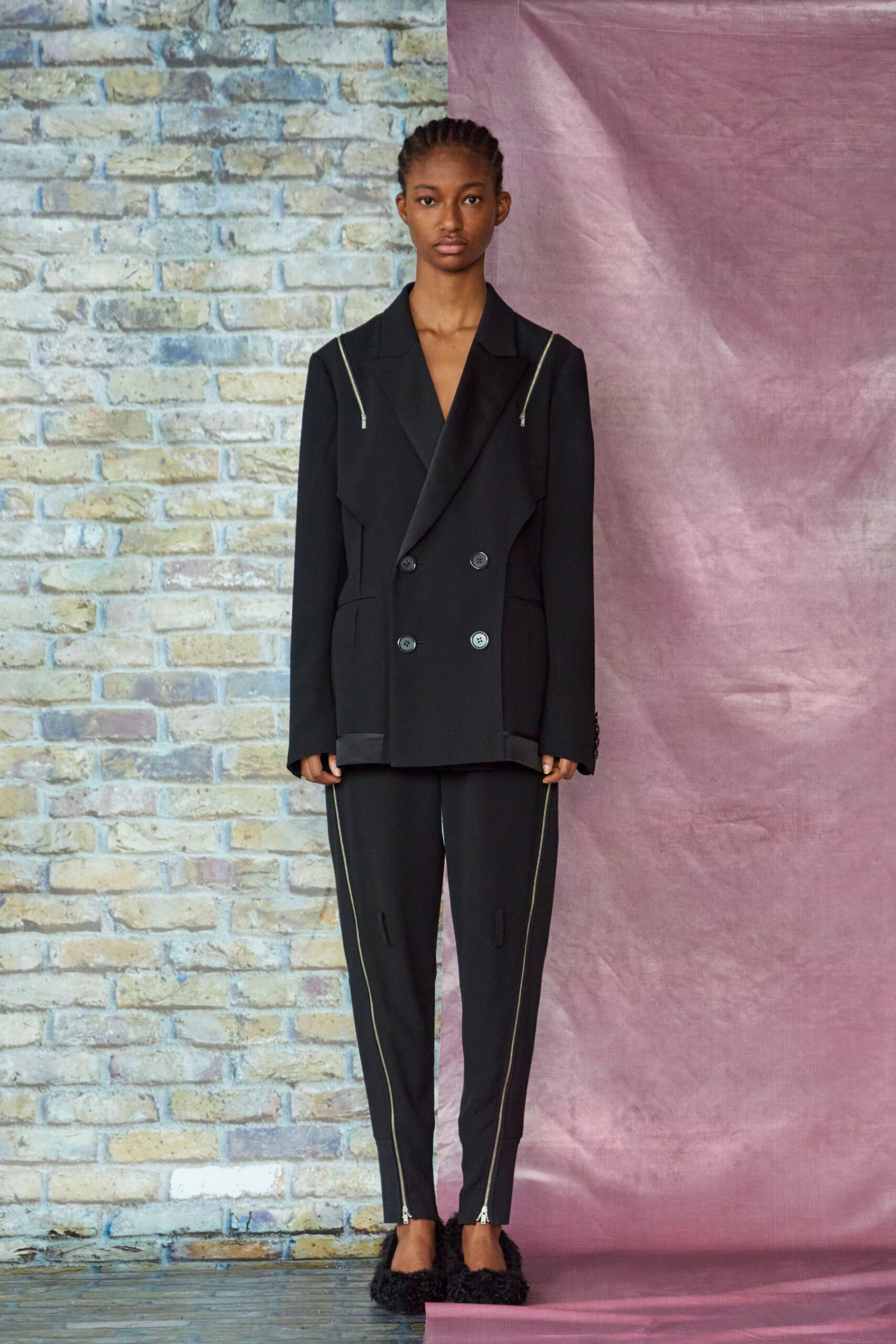 black structured blazer with slim pants