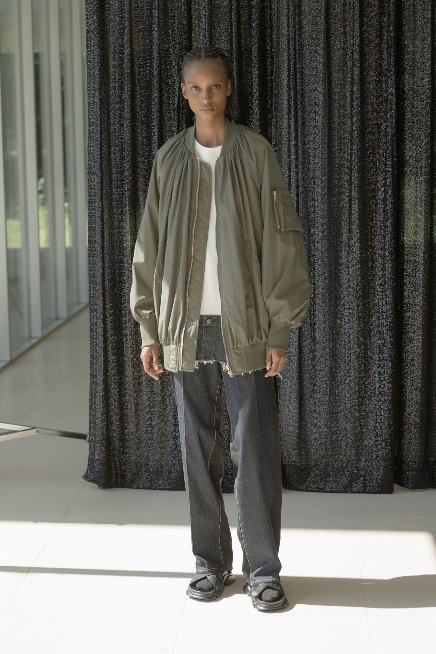 green relaxed jacket with white t-shirt