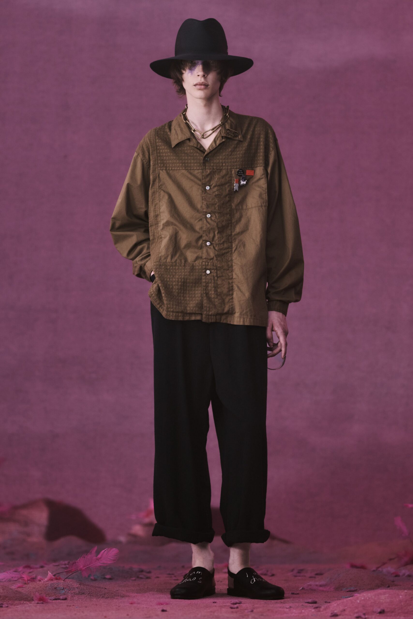 brown checked shirt with black pants