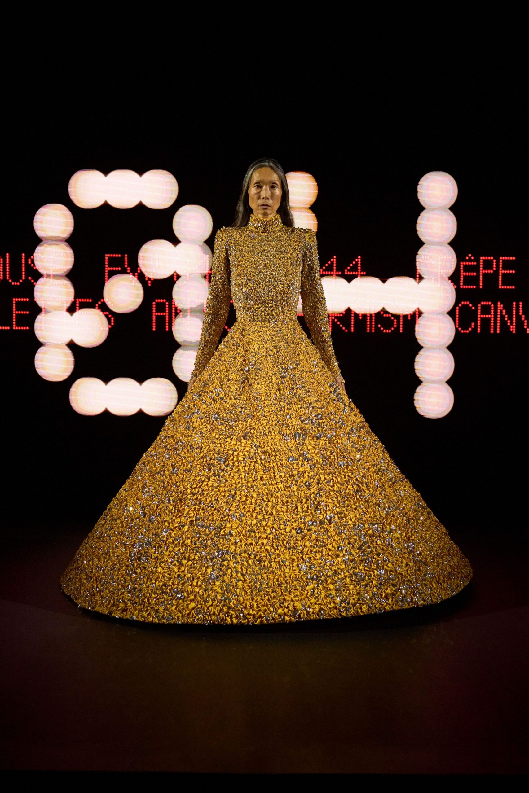 yellow embellished long-sleeve gown