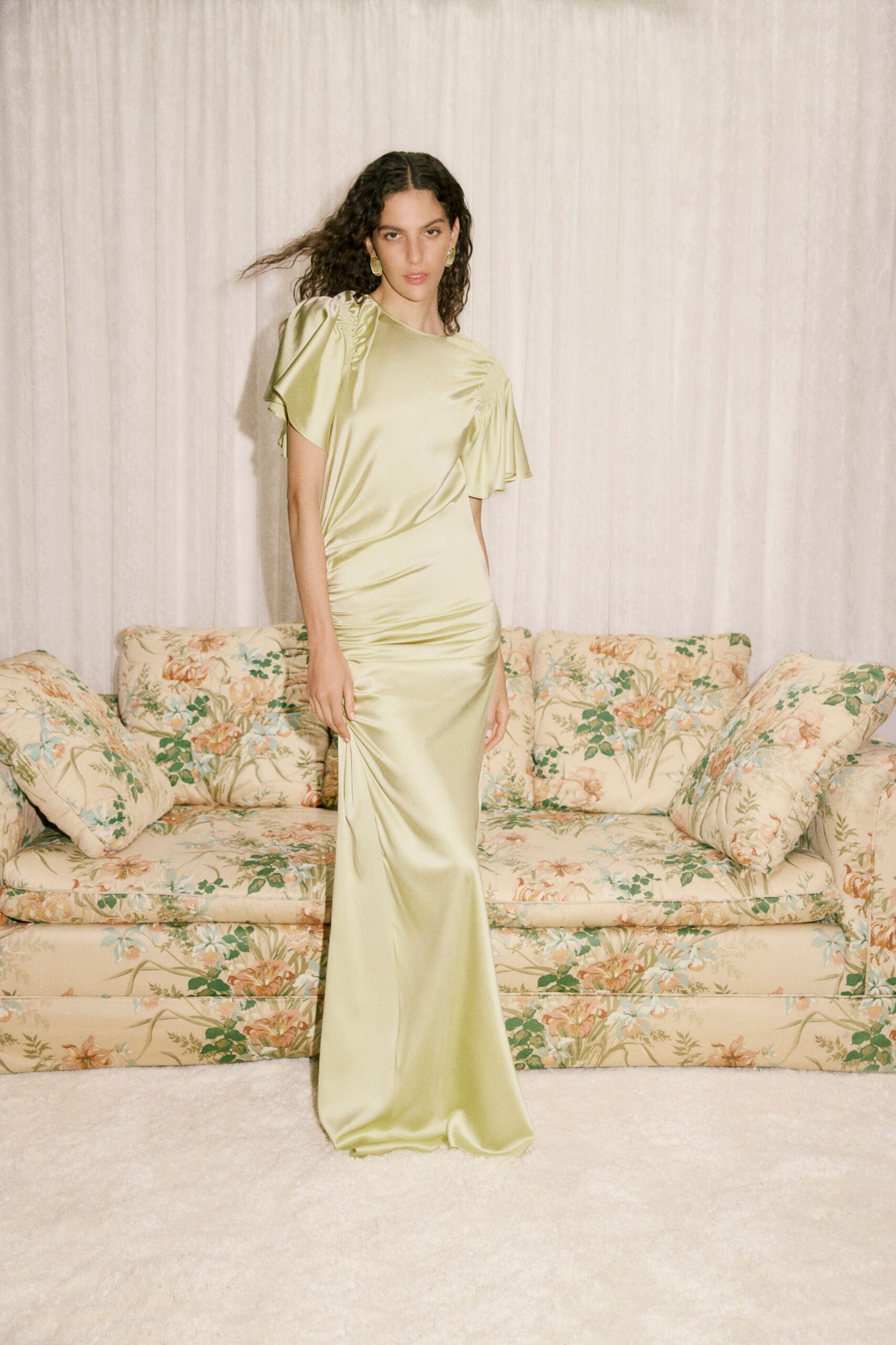 green satin fitted gown