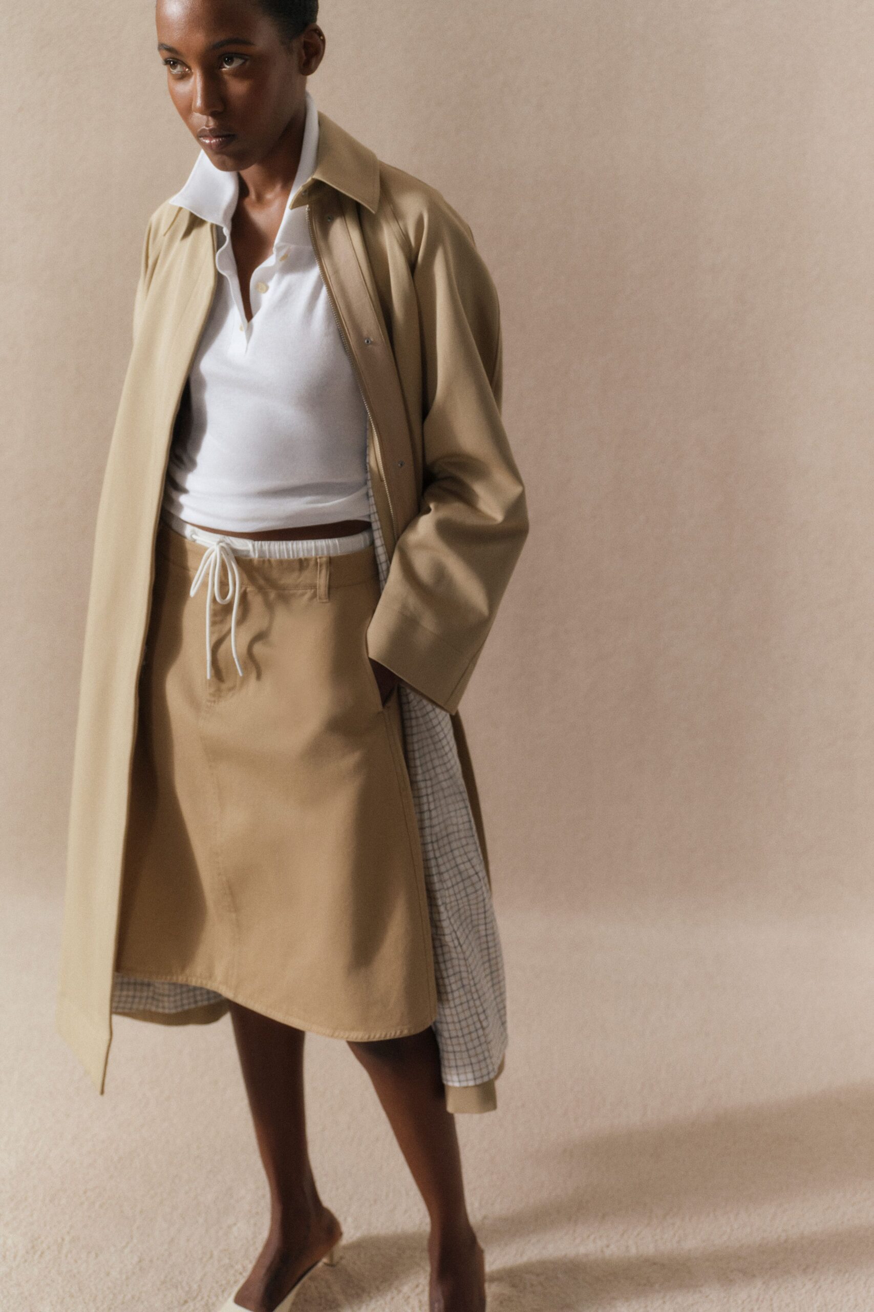 beige cotton long-sleeve collared relaxed buttoned coat