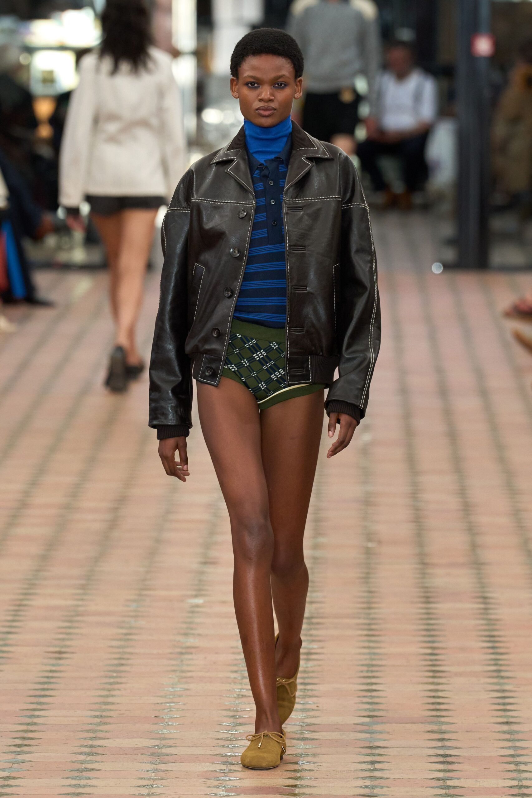 black leather jacket with blue top