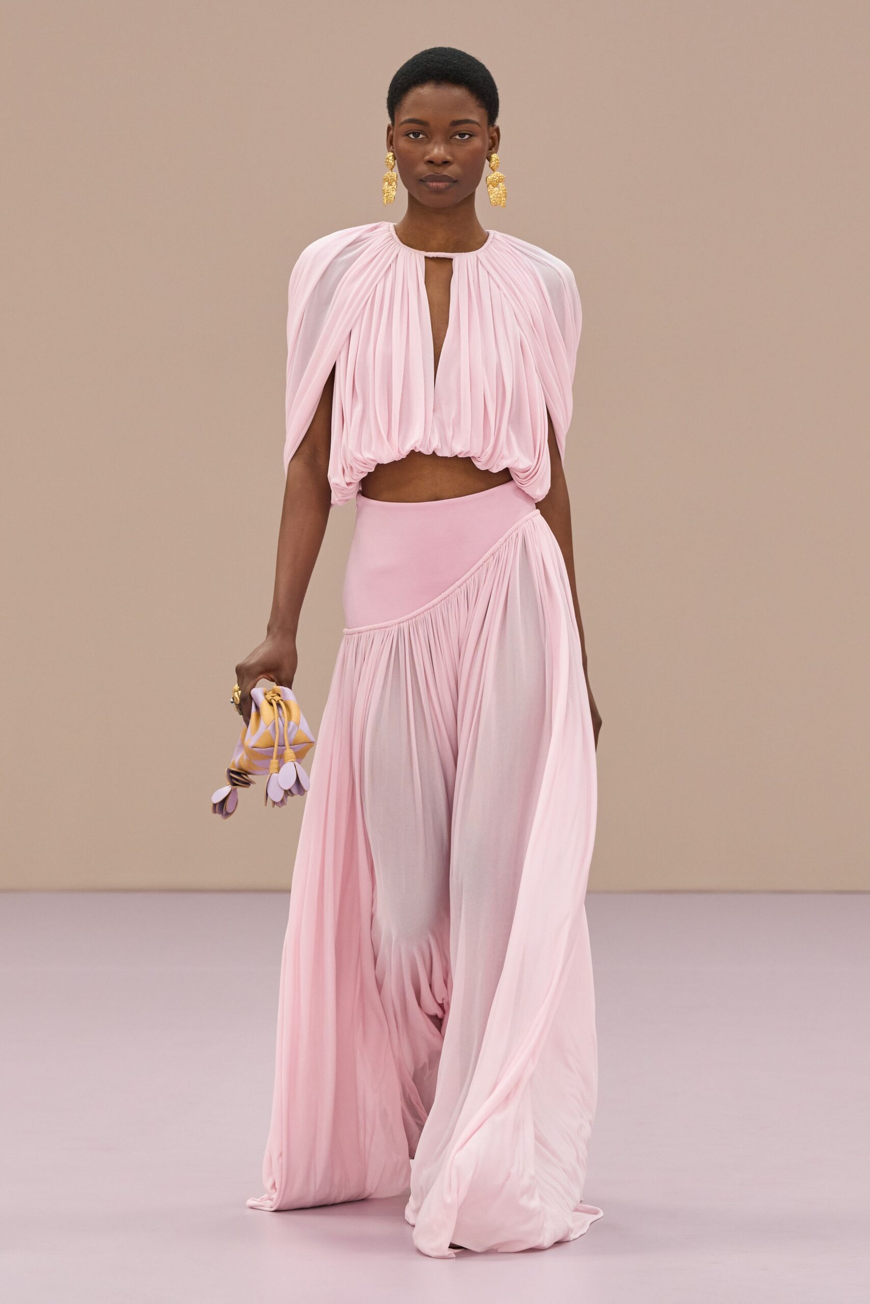 pink silk fitted high-waisted pleated flowing maxi skirt